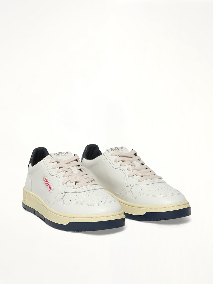 Maison Kitsune Medalist Sneaker in White/Blue Front View | AUTRY
