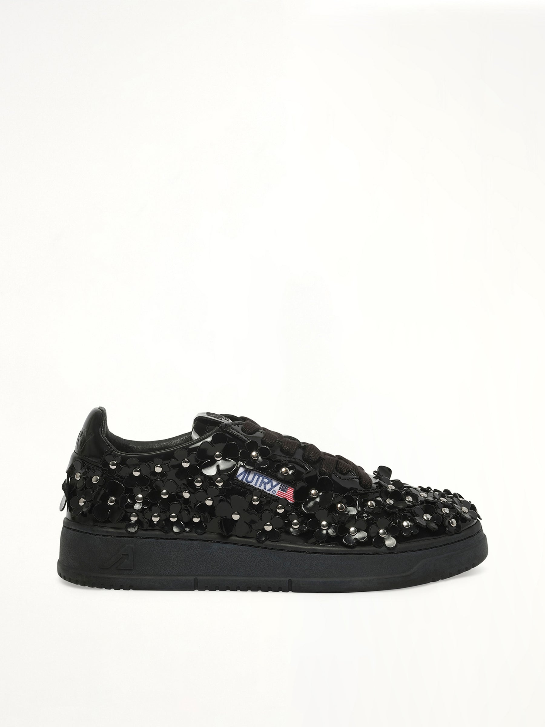 Medalist Low Patent Flower Sneaker in Black Side View | AUTRY