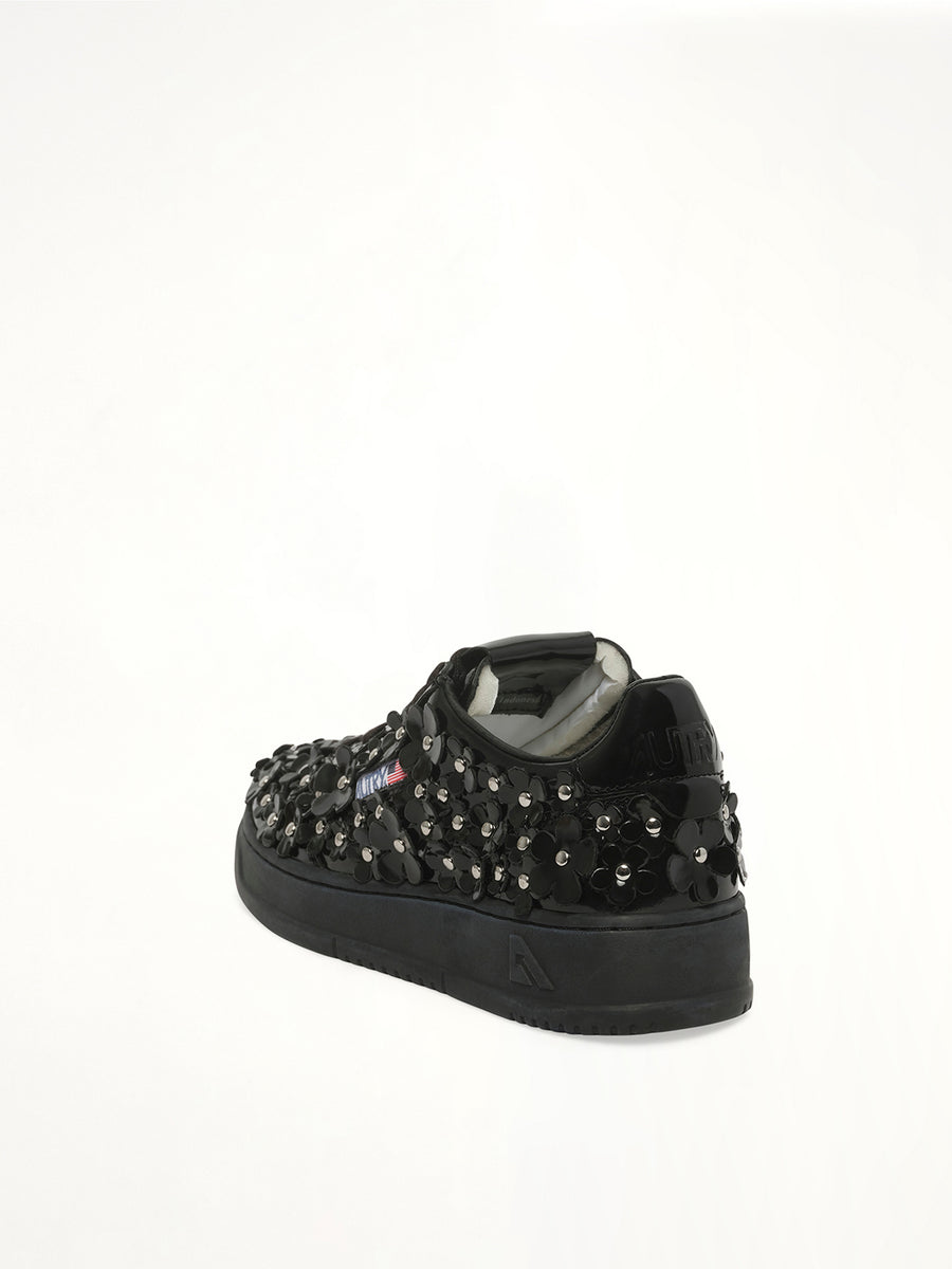 Medalist Low Patent Flower Sneaker in Black Back View | AUTRY