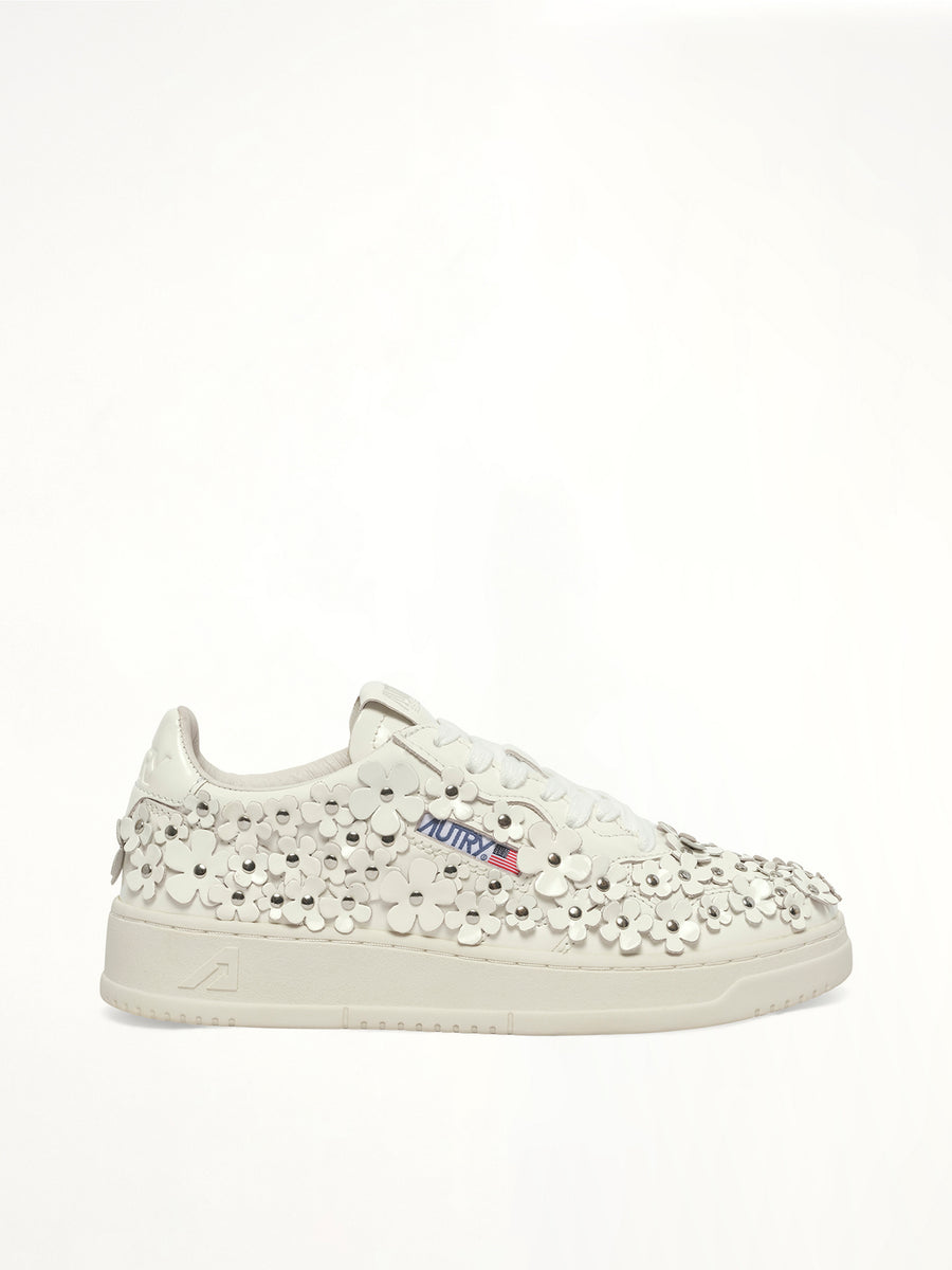Medalist Low Patent Flower Sneaker in White Side View | AUTRY