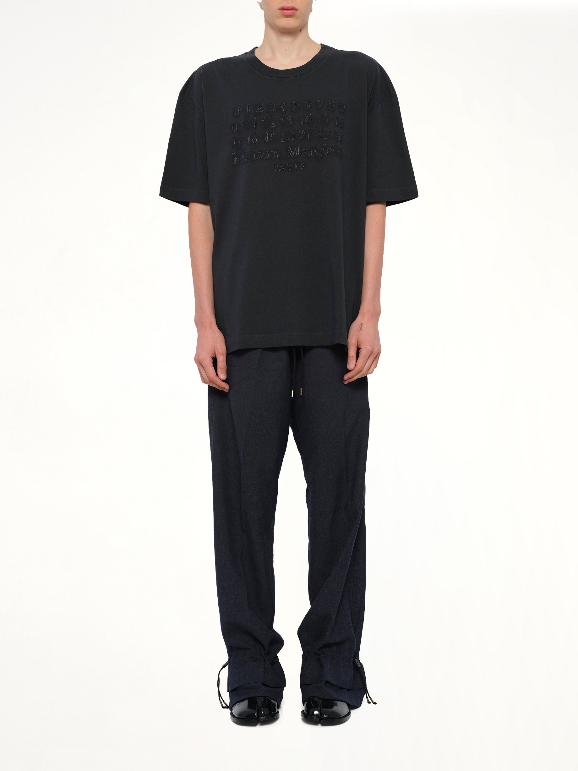 MAISON MARGIELA , Memory of Logo T-Shirt in Charcoal Model View from MARAIS