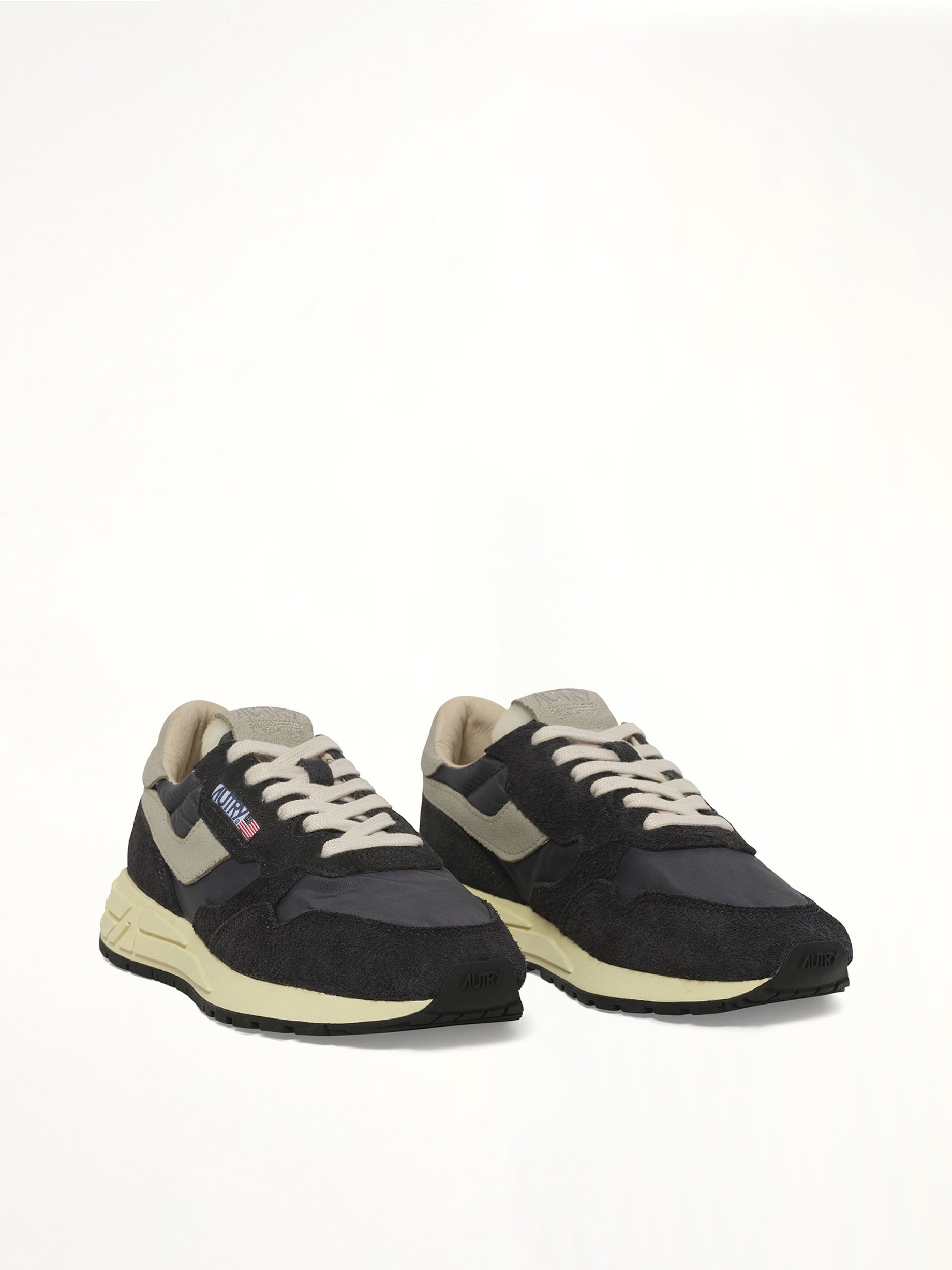 Reelwind Low Sneakers in White/Black Front View | AUTRY