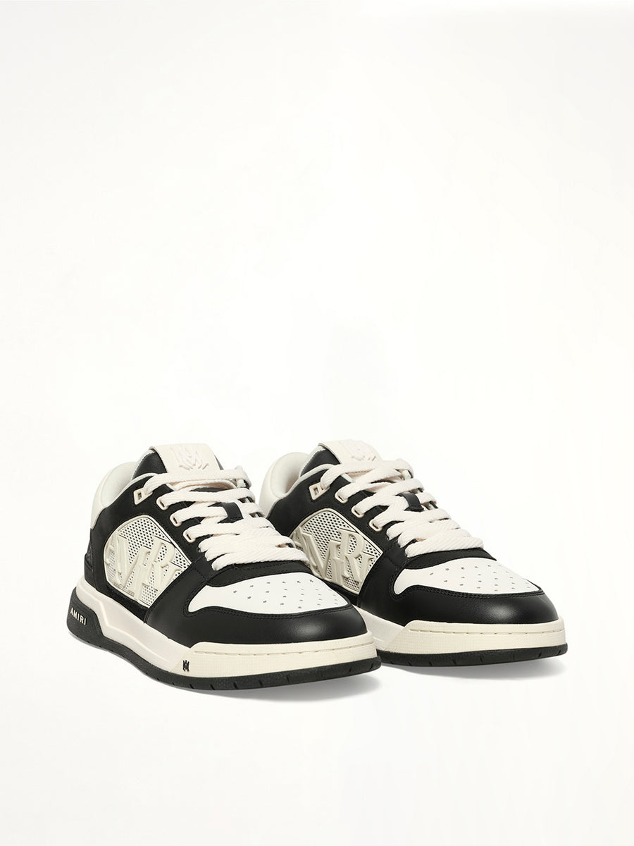MA Quad Debossed Classic Low in Black Front View | AMIRI