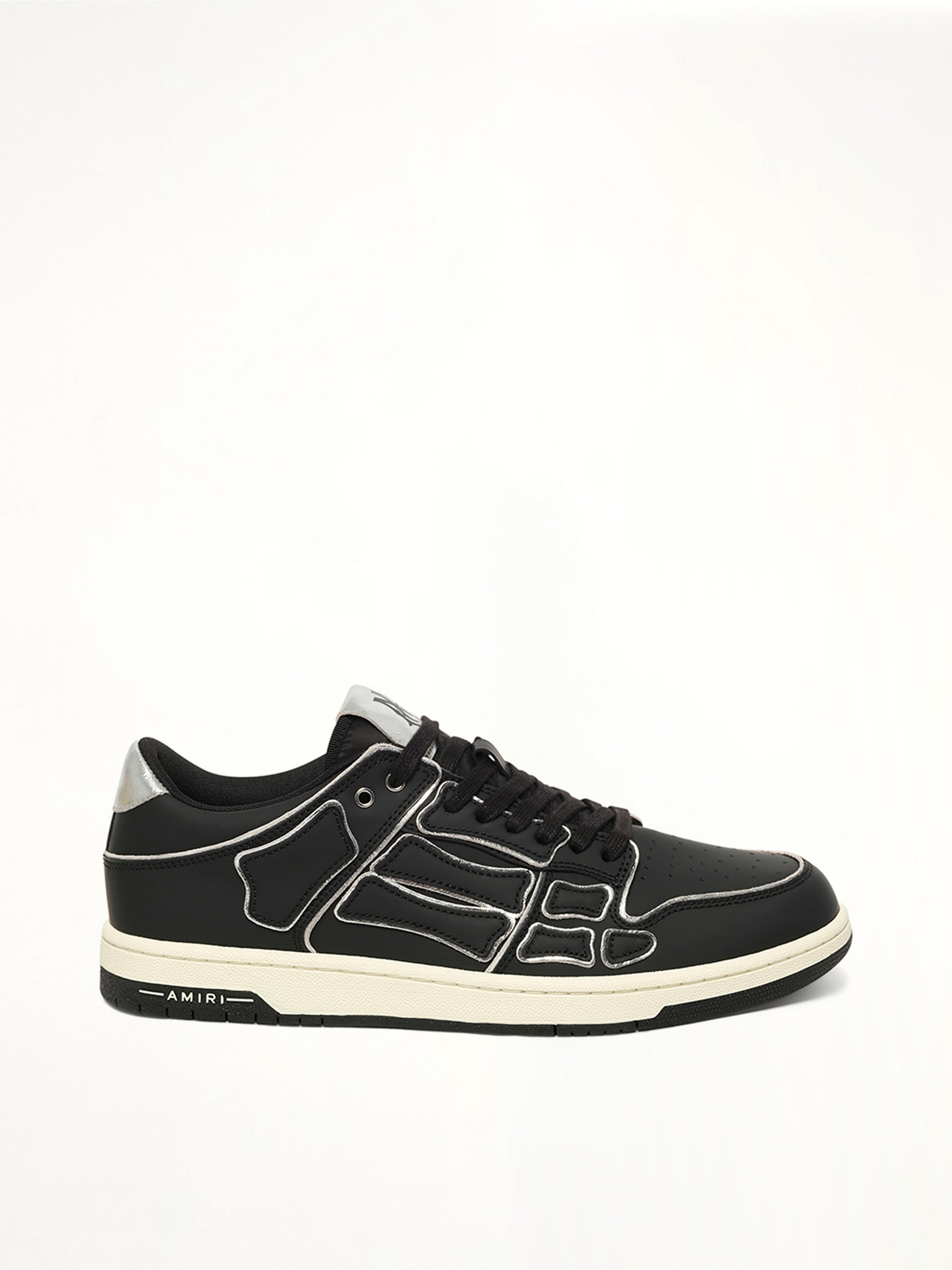 Skel Top Low Contrast Sneaker in Black Side View | AMIRI