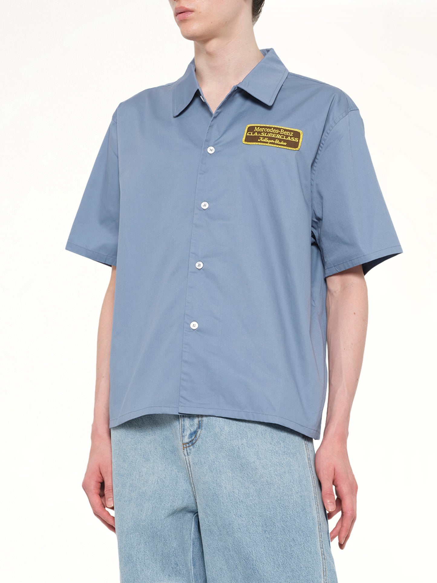 Kidsuper X Mercedes Benz Cropped Work Shirt in Blue