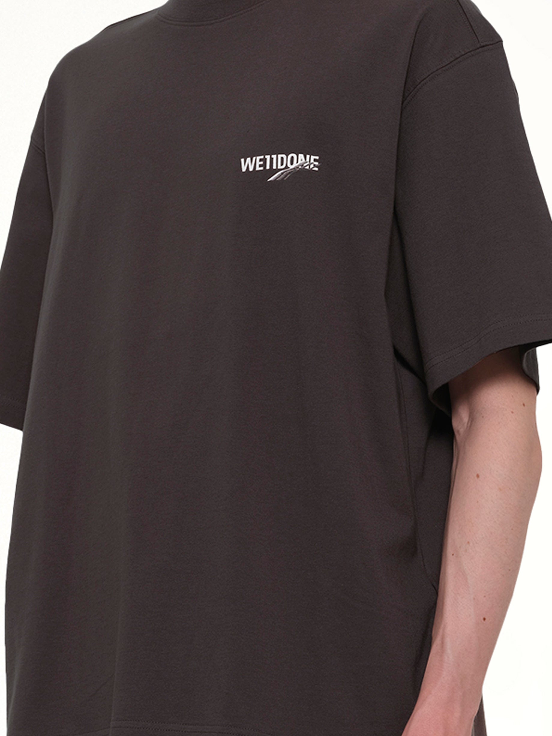 WE11DONE Wave Logo Short Sleeve T-Shirt in Charcoal Detail Shot from MARAIS