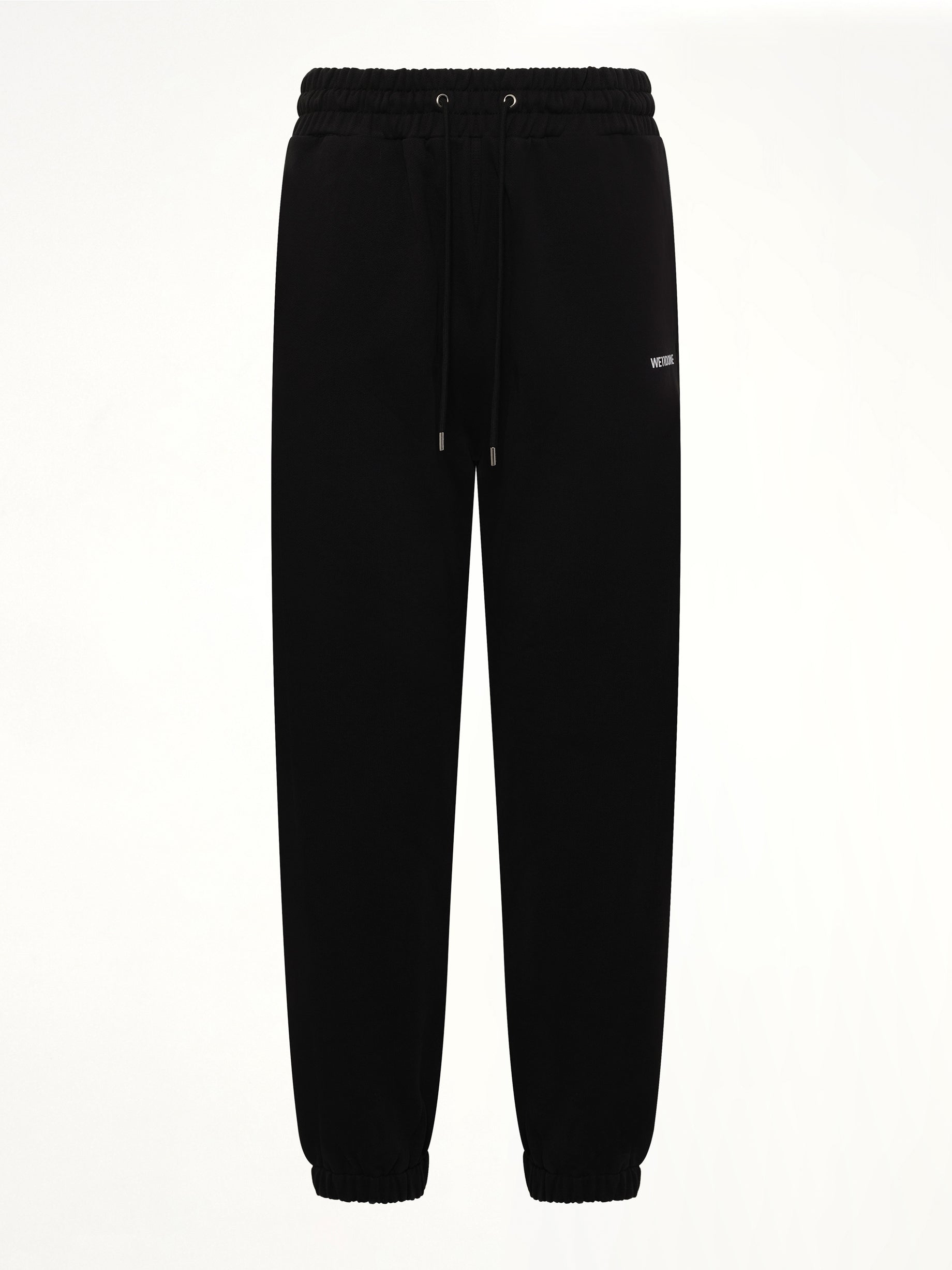 WE11DONE Logo Medium Lounge Pants in Black Product Photo from MARAIS