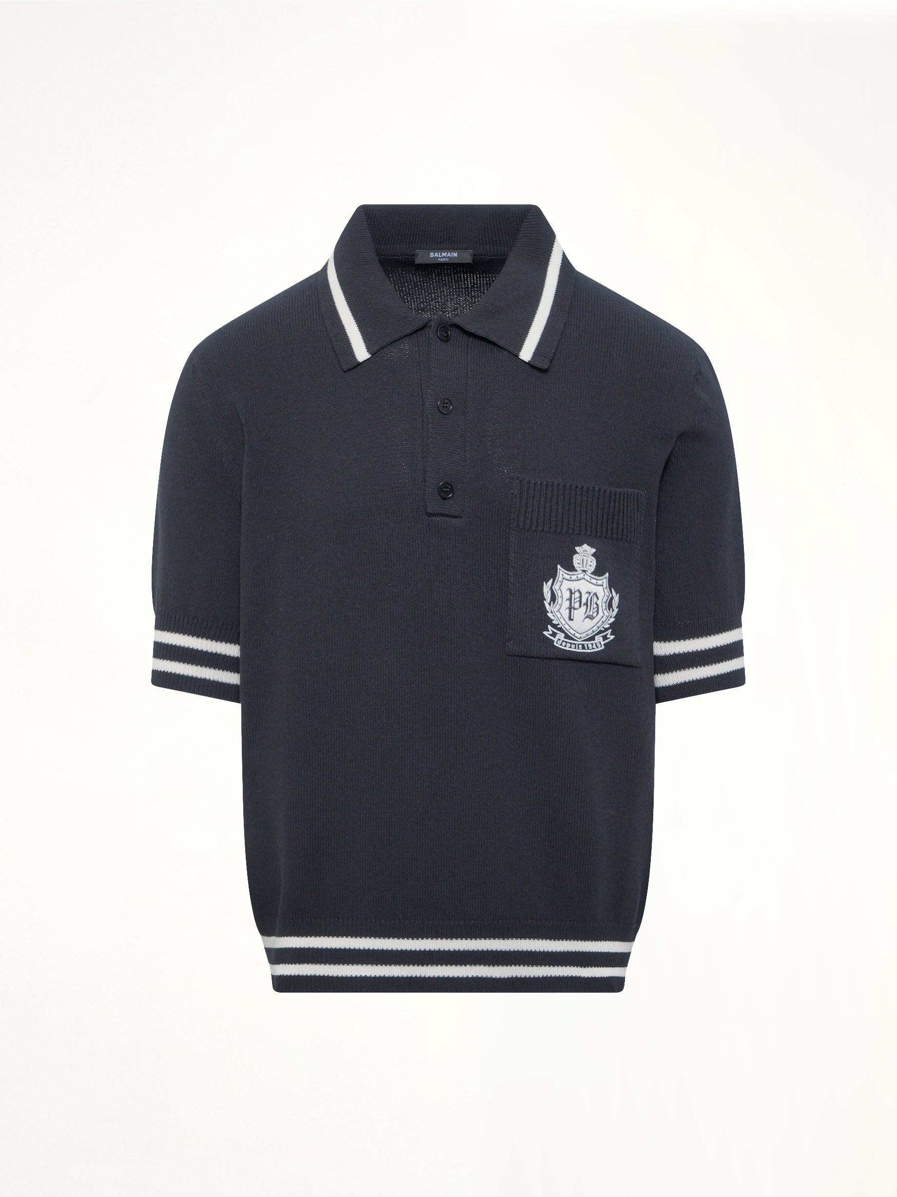 BALMAIN , College Emblem Knit Polo in Black/Natural Product Photo from MARAIS