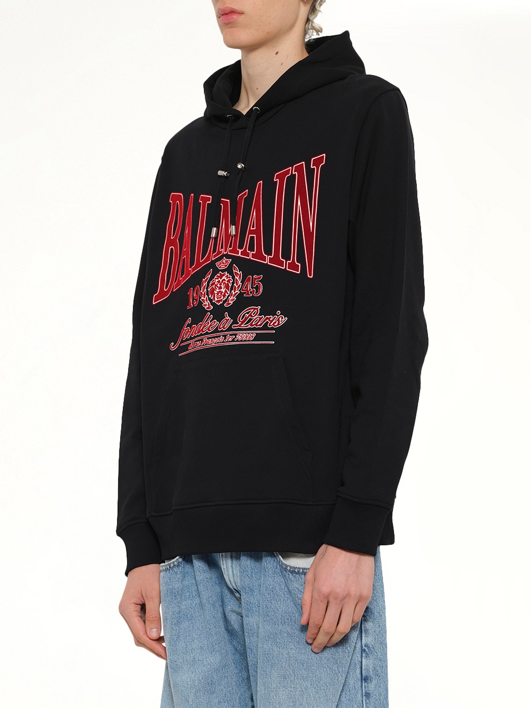 BALMAIN Balmain College Flock Hoodie in Black/Red Side View from MARAIS