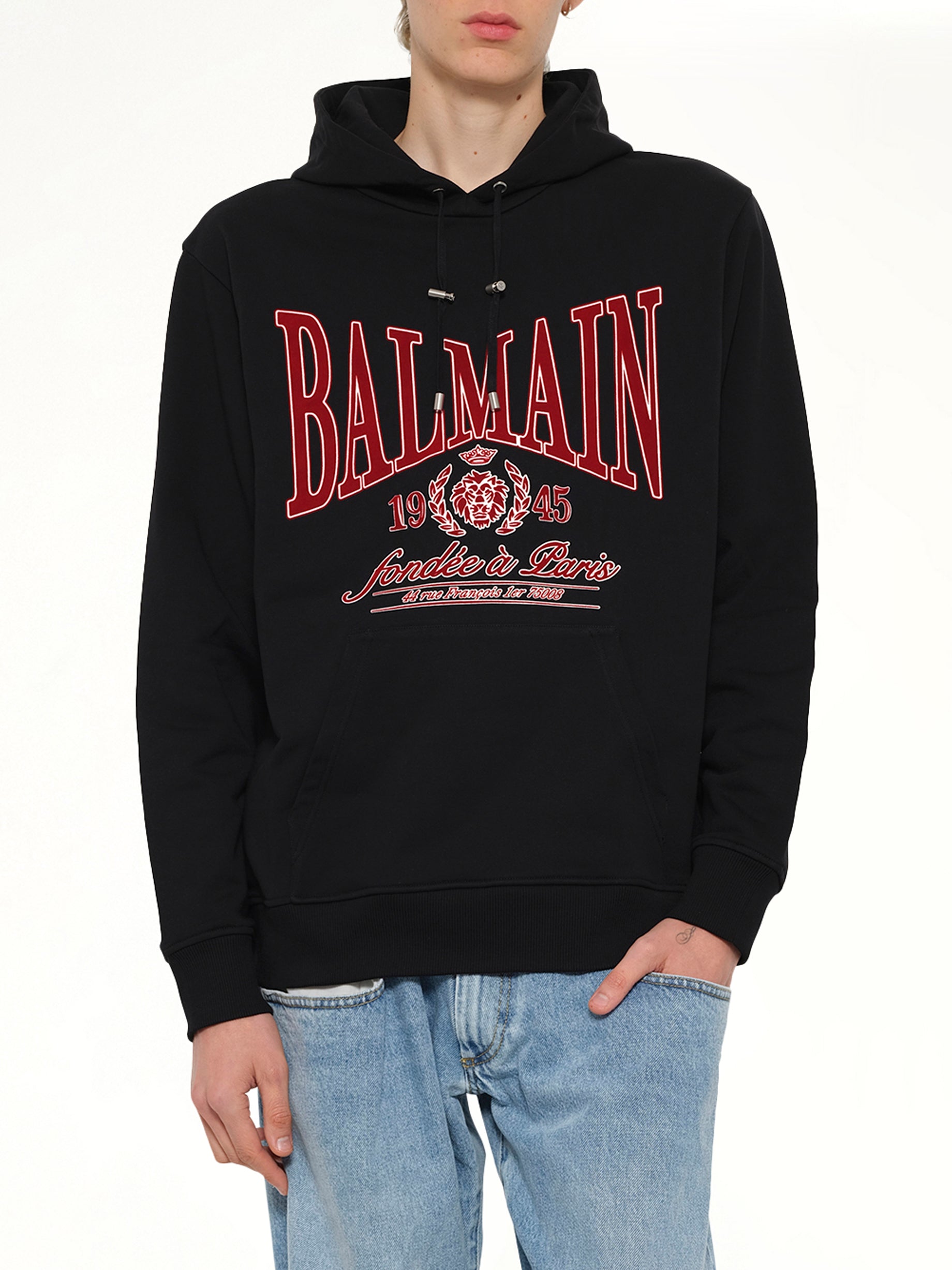BALMAIN Balmain College Flock Hoodie in Black/Red Detail Shot from MARAIS