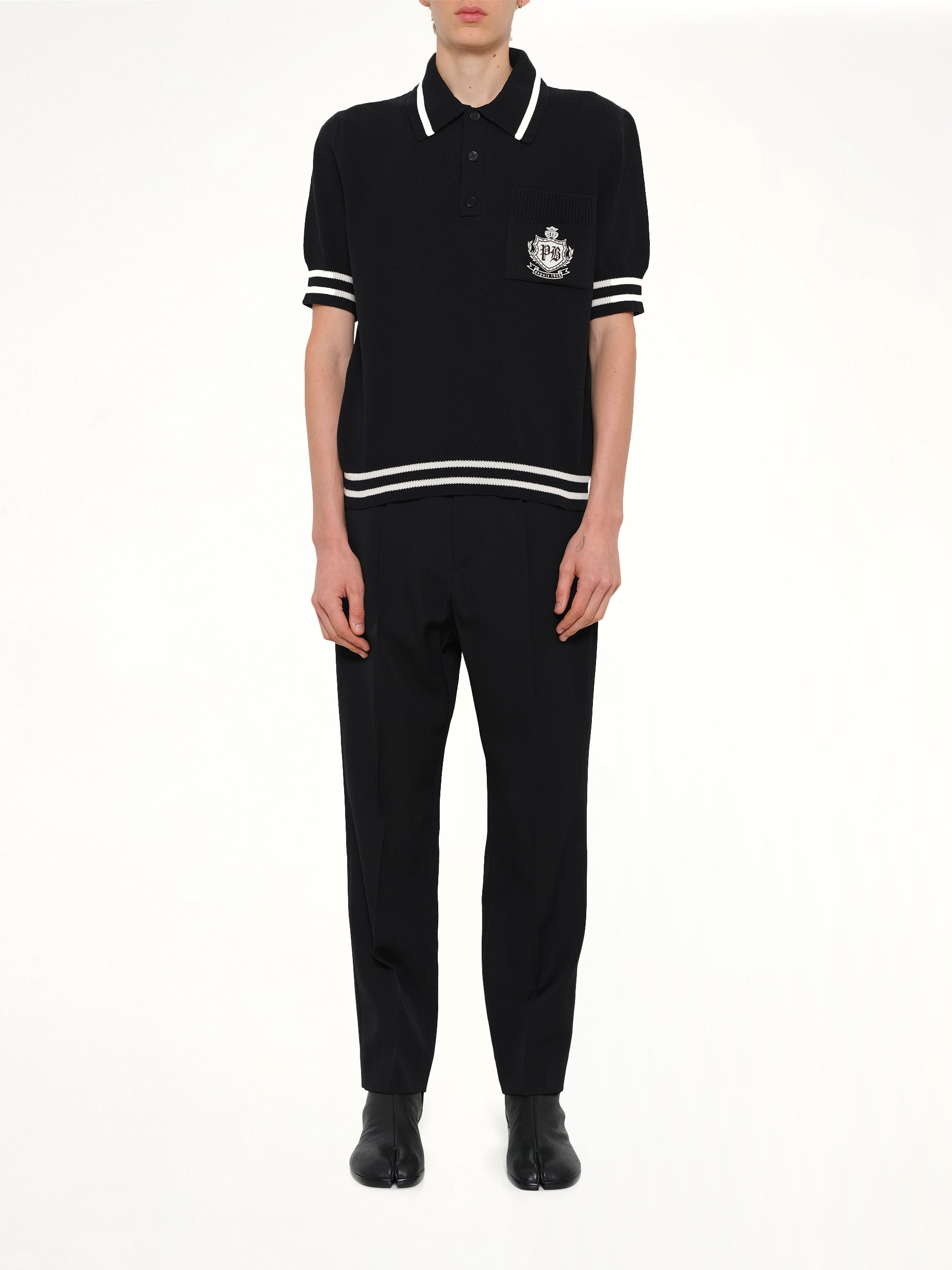 BALMAIN , College Emblem Knit Polo in Black/Natural Model View from MARAIS