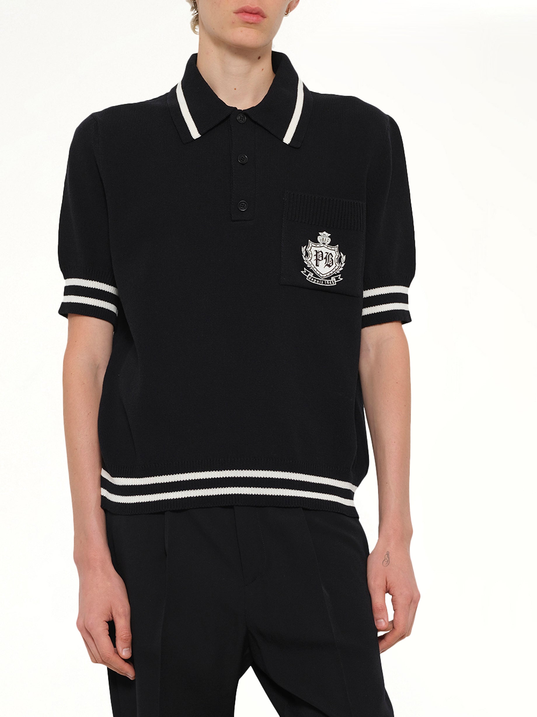BALMAIN , College Emblem Knit Polo in Black/Natural Detail Shot from MARAIS