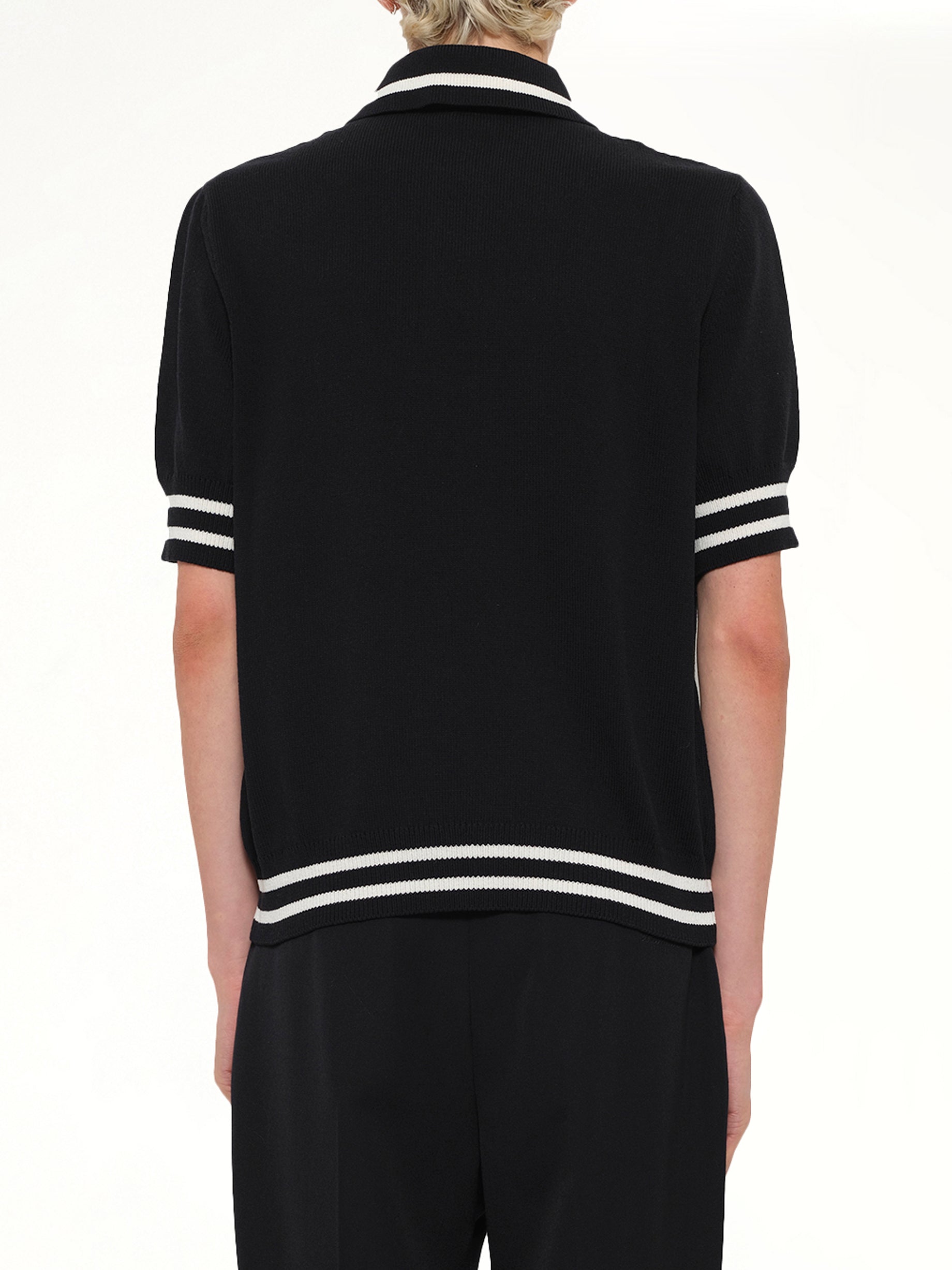 BALMAIN , College Emblem Knit Polo in Black/Natural Back View from MARAIS