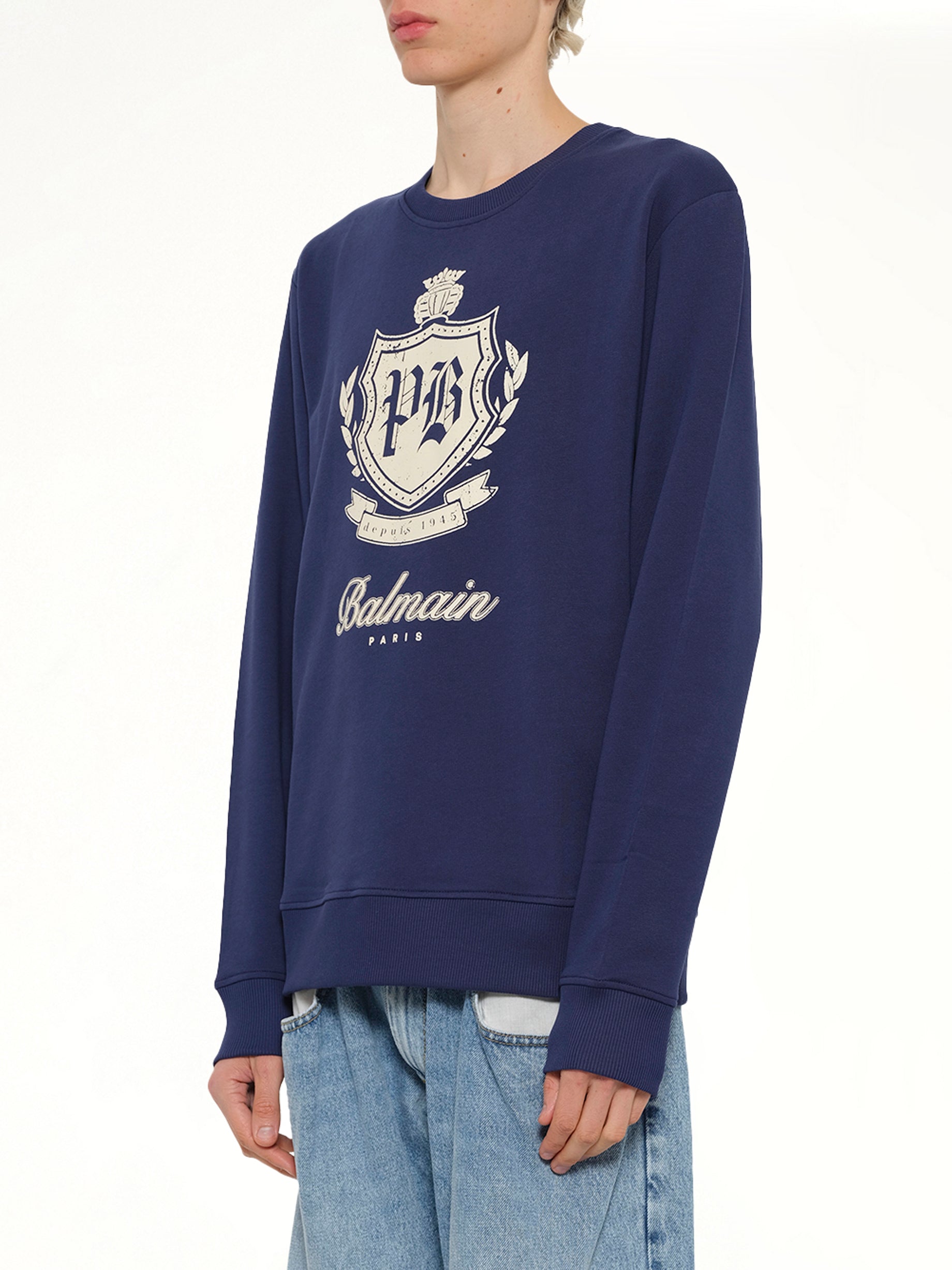 BALMAIN College Emblem Sweatshirt in Blue/Beige Side View from MARAIS