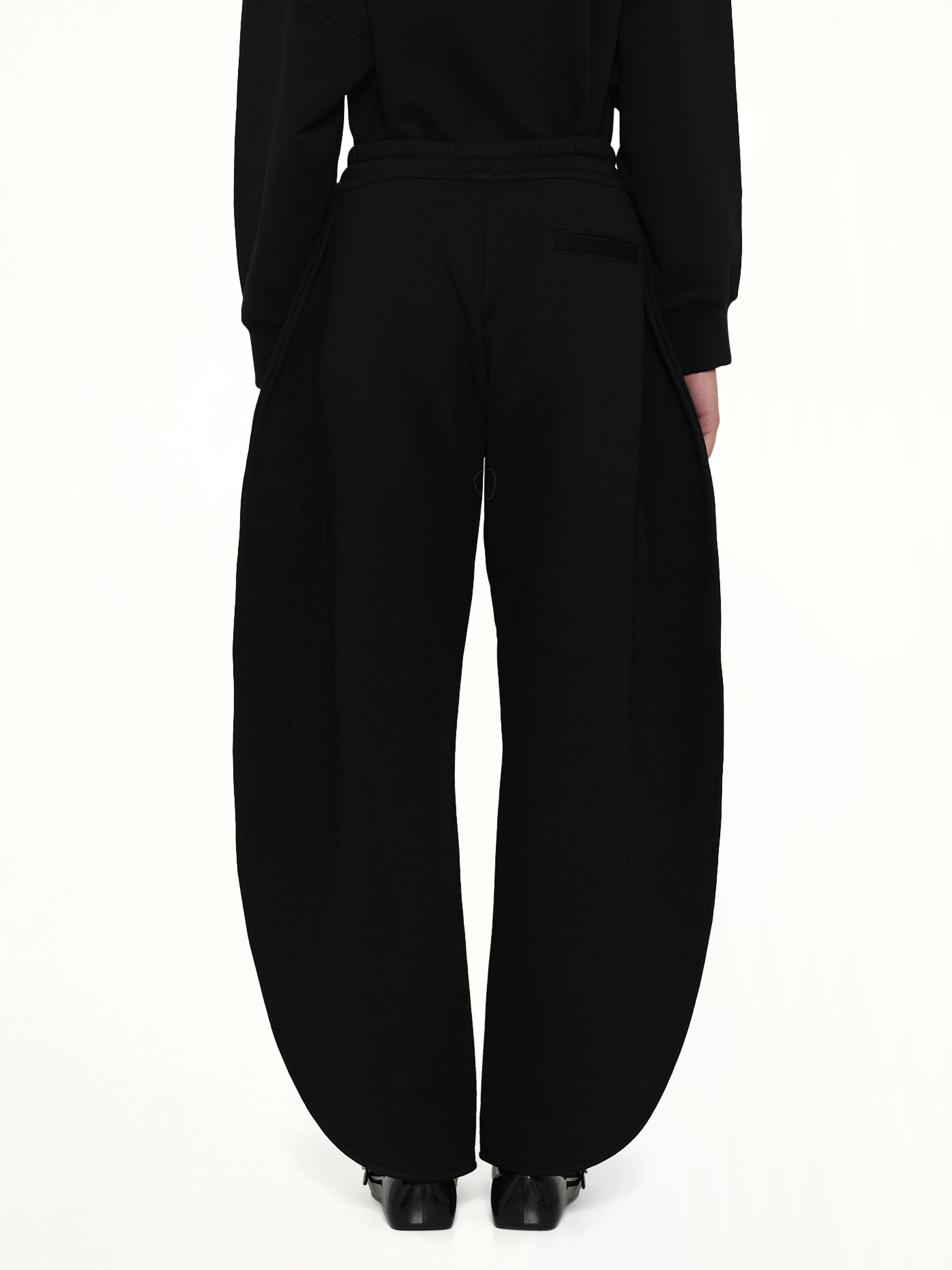 ALAIA Petal Joggers in Black Back View from MARAIS