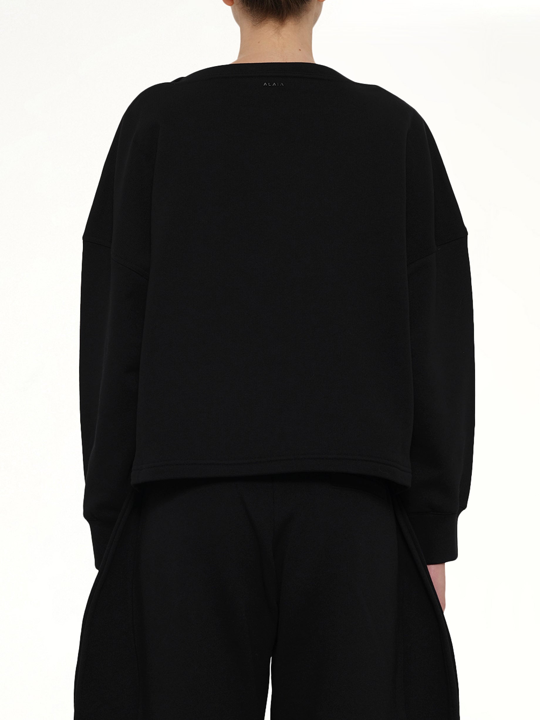 ALAIA Boatneck Sweatshirt in Black Back View from MARAIS