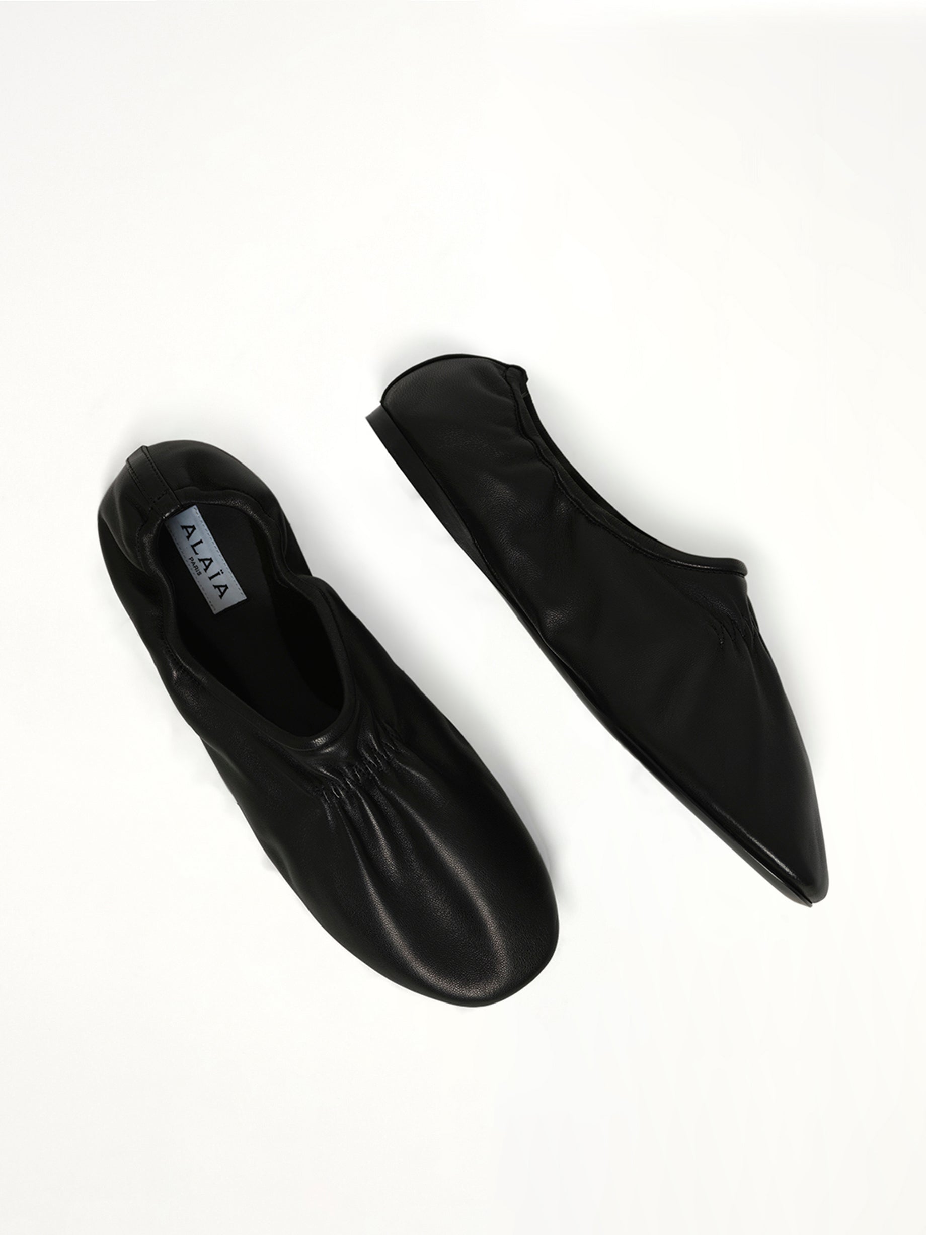 Supple Slippers in Black Top View | ALAIA