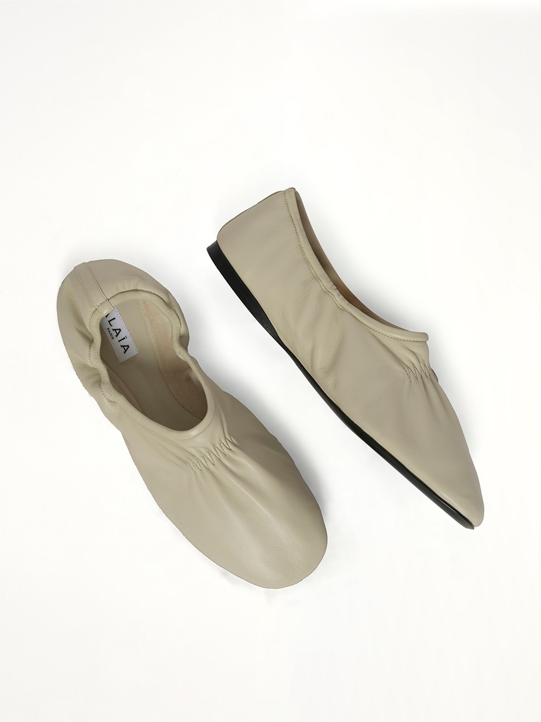 Supple Slippers in White Top View | ALAIA