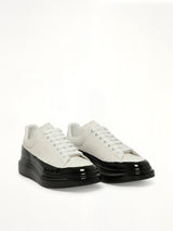 Larry Oversized Dipped Sneaker in White/Black Front View | ALEXANDER MCQUEEN