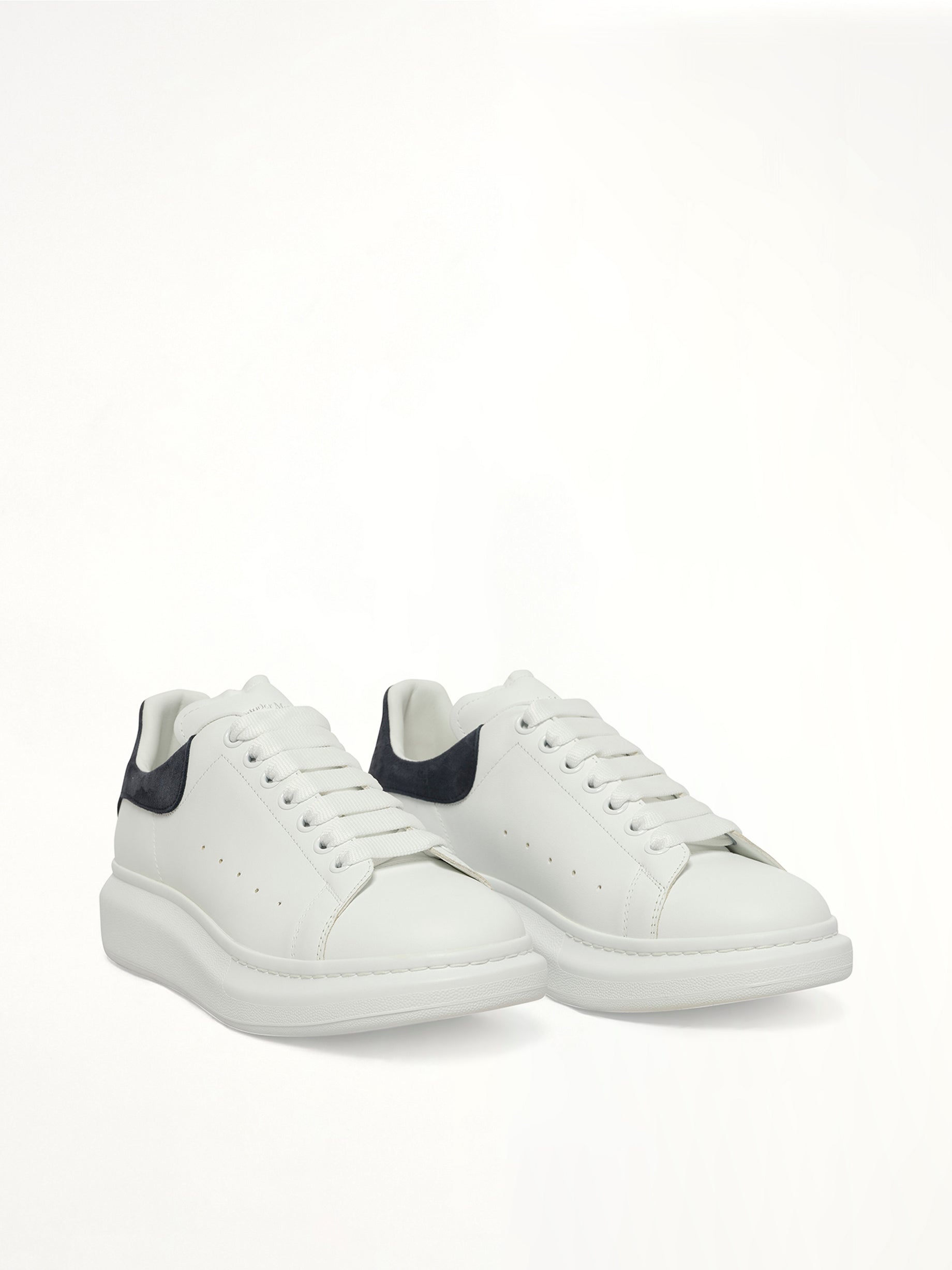 ALEXANDER MCQUEEN Larry Oversized Sneaker in White/Blue Grey Front View from MARAIS