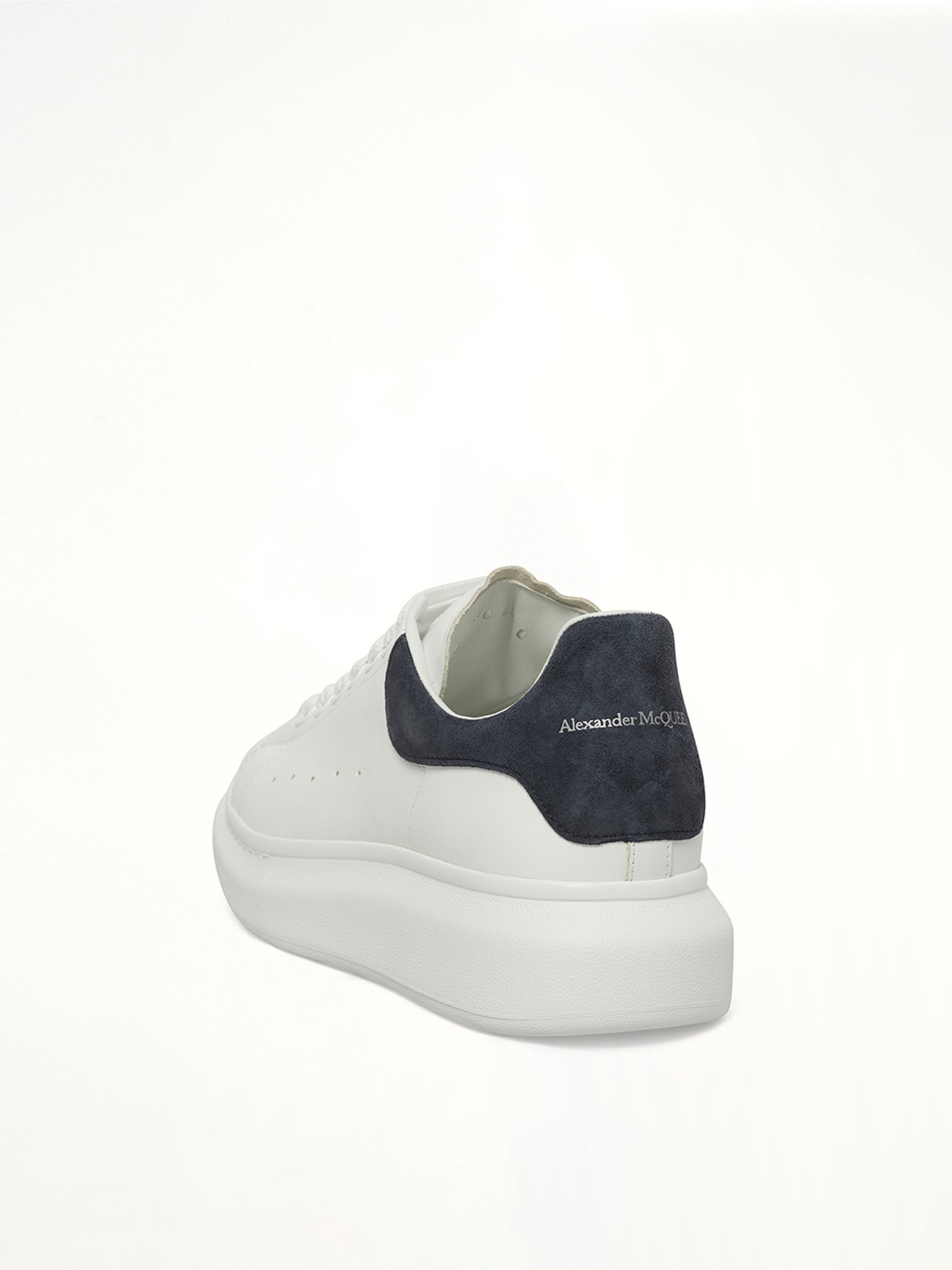 ALEXANDER MCQUEEN Larry Oversized Sneaker in White/Blue Grey Back View from MARAIS