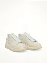 Larry Oversized Sneaker in White/Latte Front View | ALEXANDER MCQUEEN