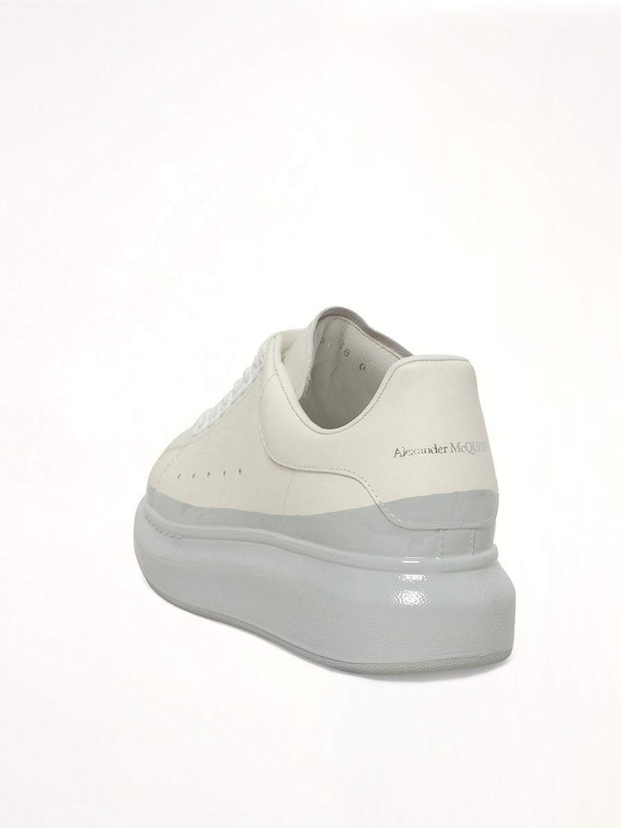 Womens Larry Oversized Sneaker in White/Ice Blue Back View | ALEXANDER MCQUEEN