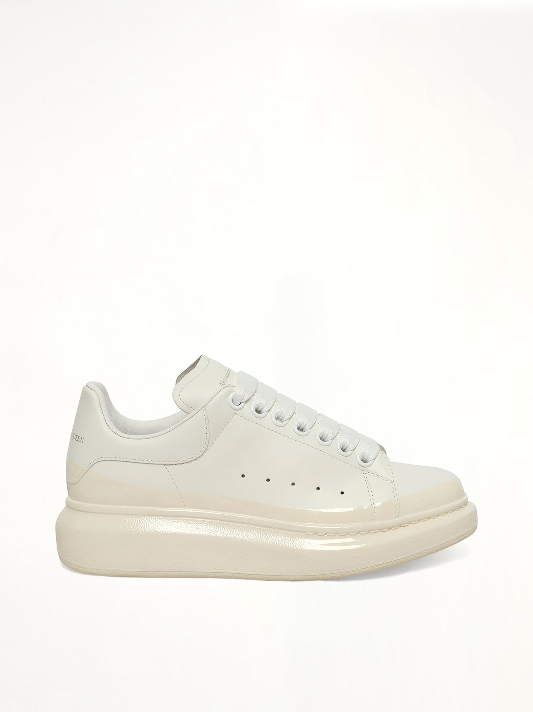 Womens Larry Oversized Sneaker in White/Tan Side View | ALEXANDER MCQUEEN