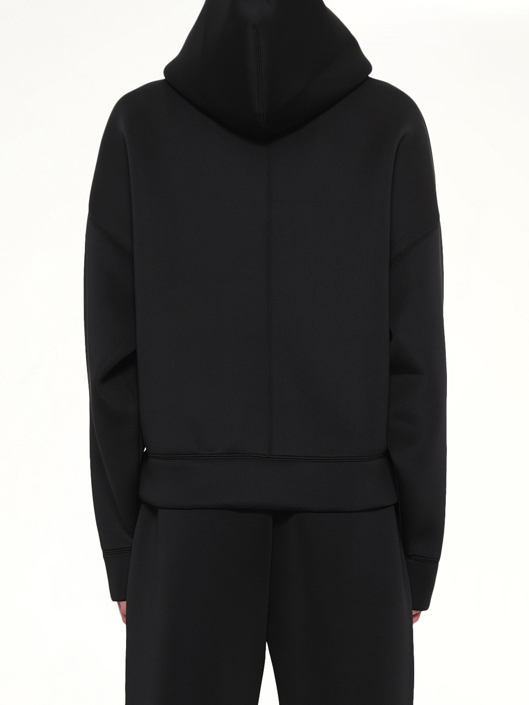 ENTIRE STUDIOS Scuba Zip Hood in Black Back View from MARAIS