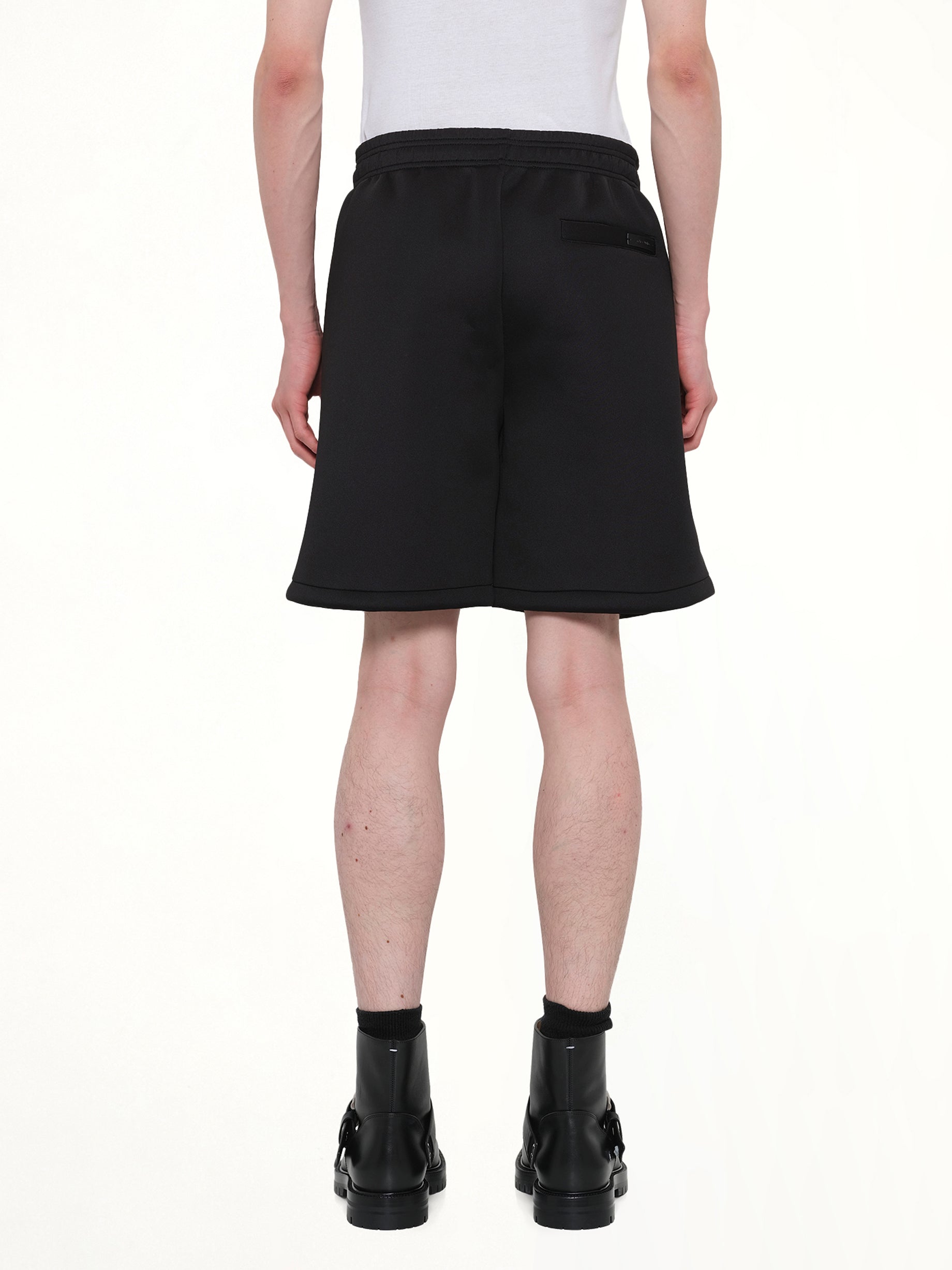 ENTIRE STUDIOS Scuba Short in Black Back View from MARAIS