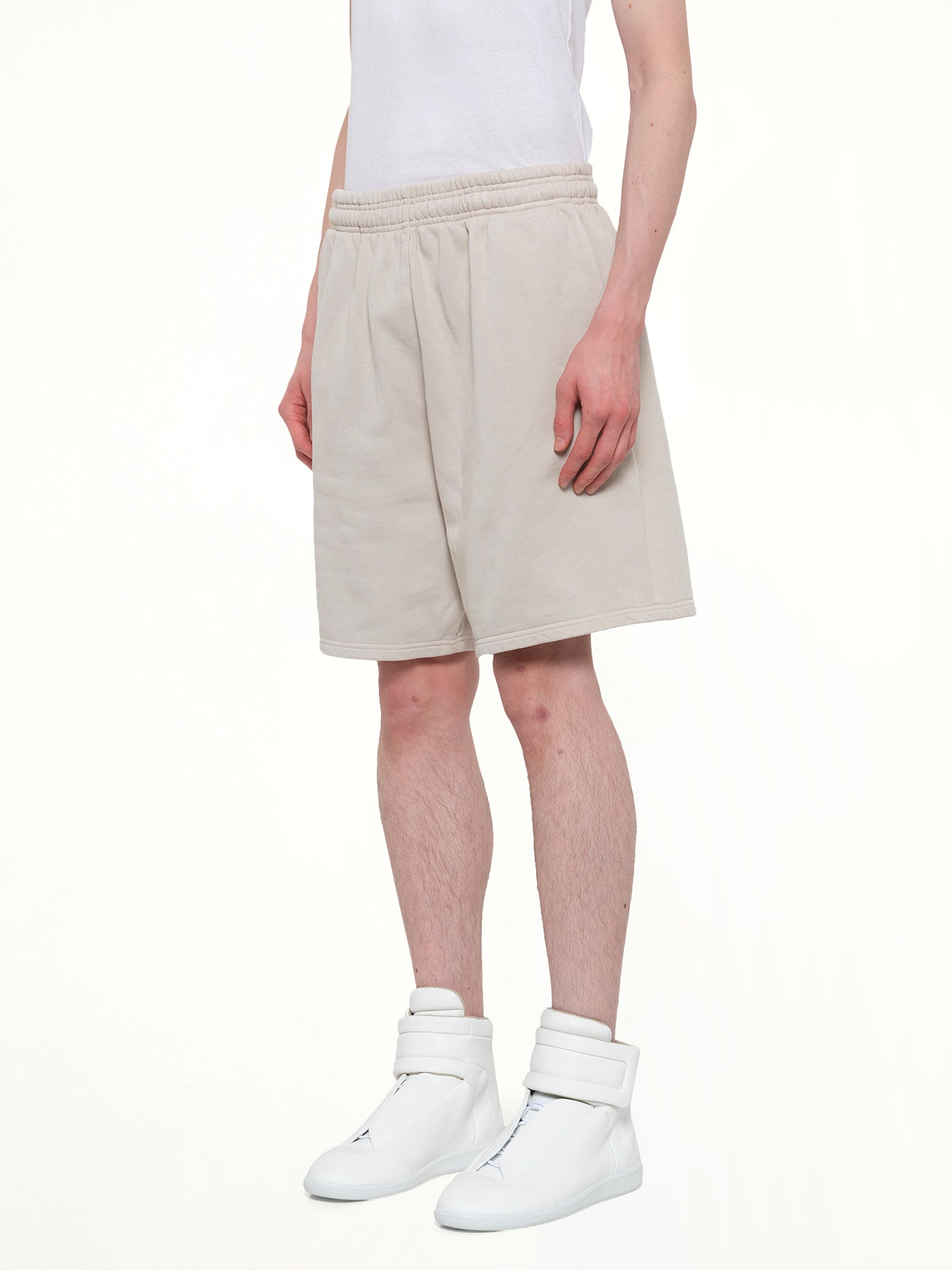 ENTIRE STUDIOS Standard Sweatshort in Off White Side View from MARAIS