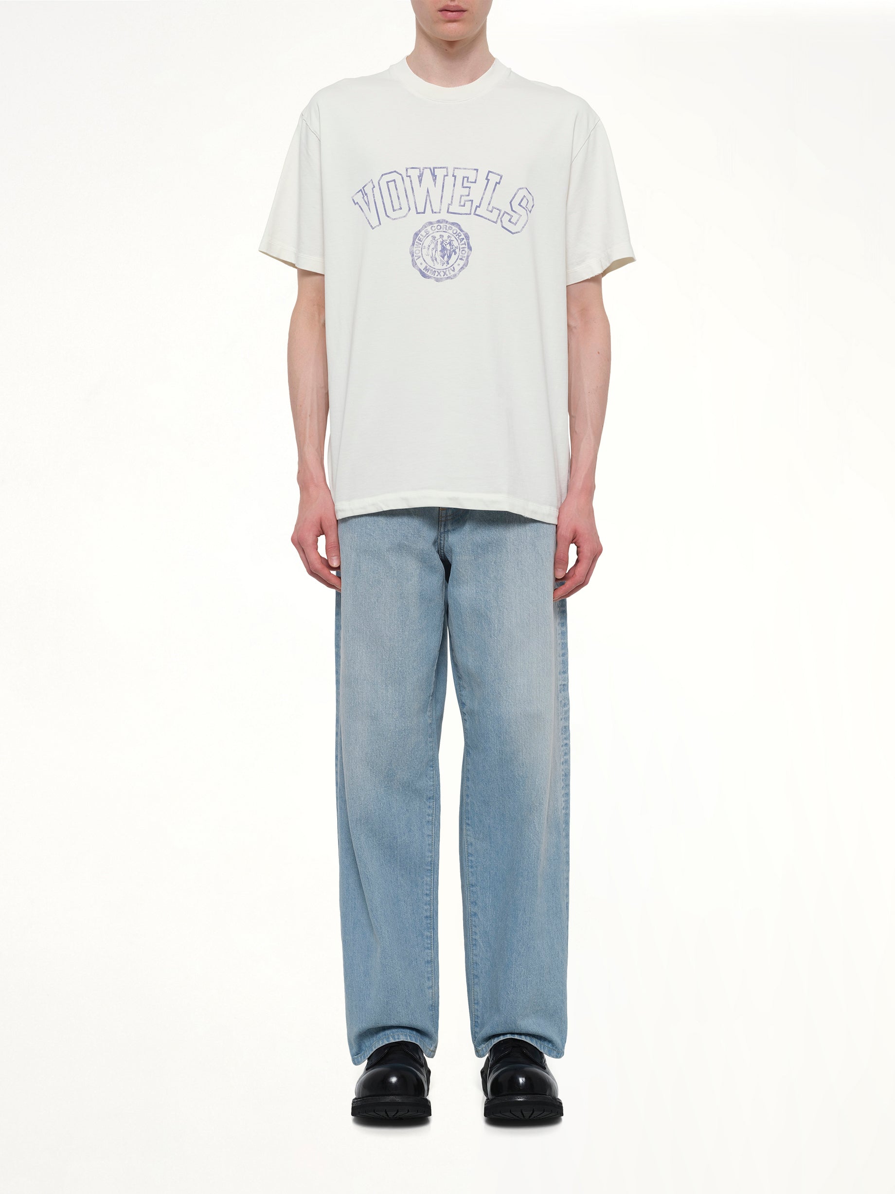 VOWELS Faded Collegiate T-Shirt in White Model View from MARAIS