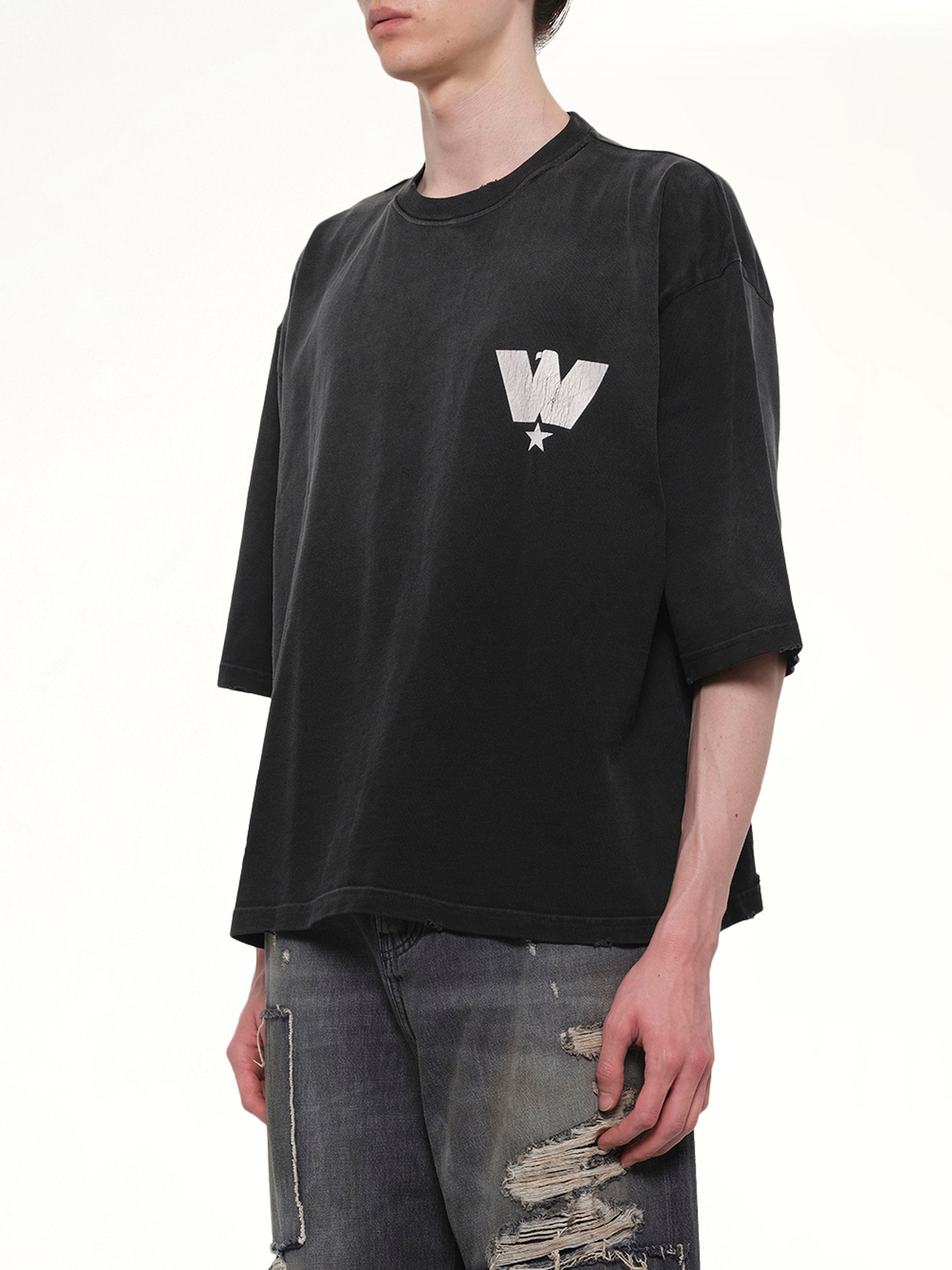 WILLY CHAVARRIA Fashion Service Association Buffalo T-Shirt in Black Side View from MARAIS