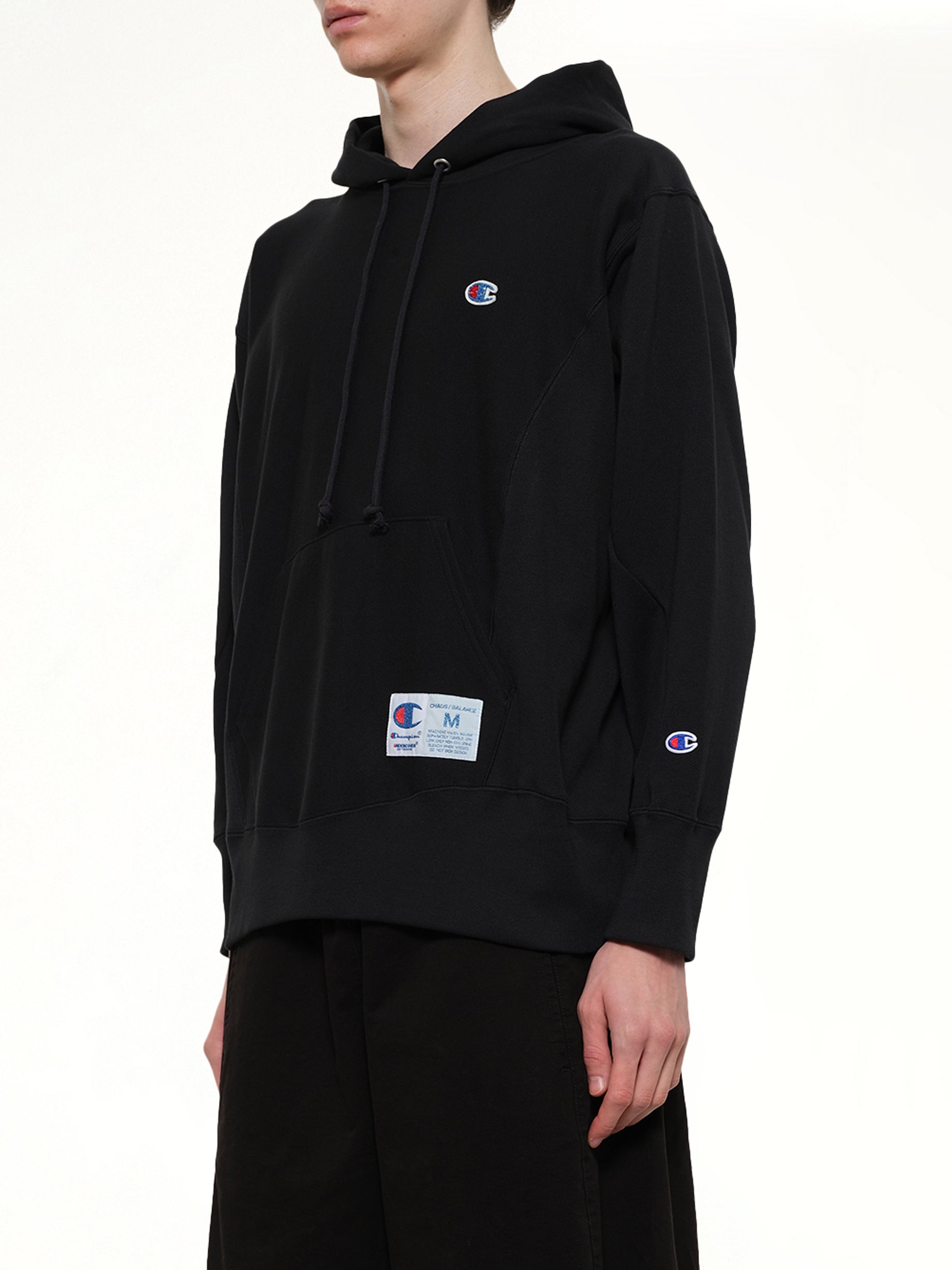 UNDERCOVER Champion x UC Hoodie in Black Side View from MARAIS