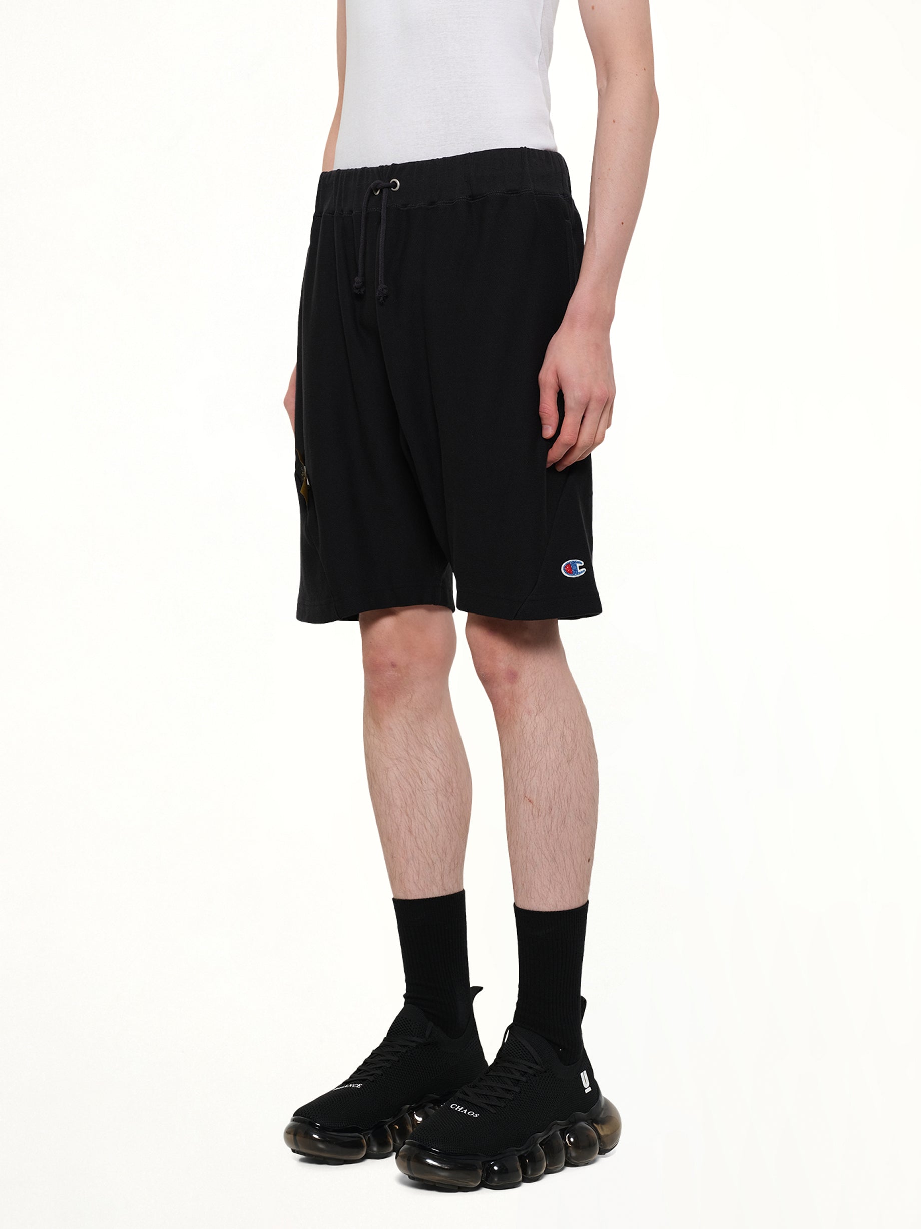 UNDERCOVER Champion x UC Sweatshorts in Black Side View from MARAIS