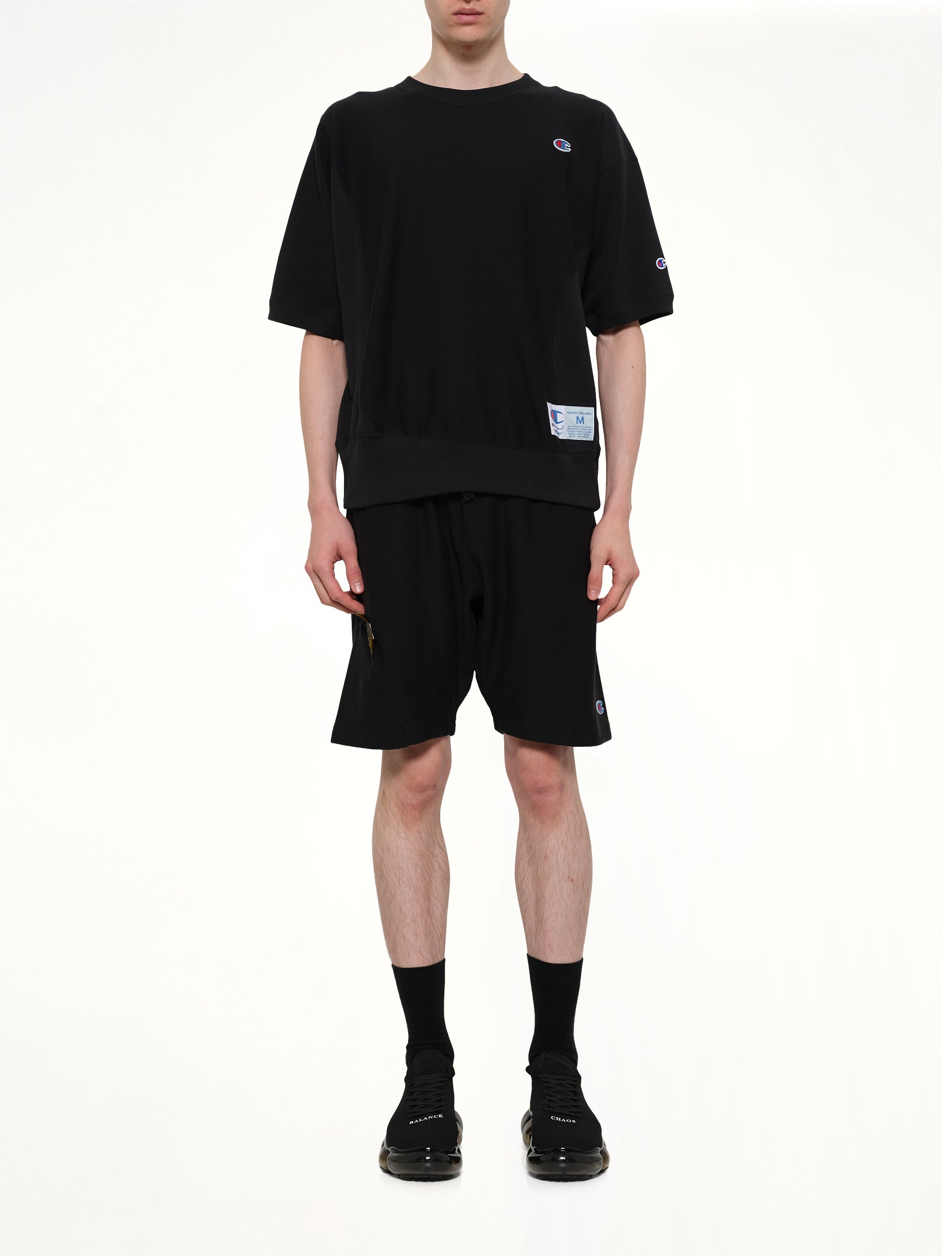 UNDERCOVER Champion x UC Sweat Top in Black Model View from MARAIS