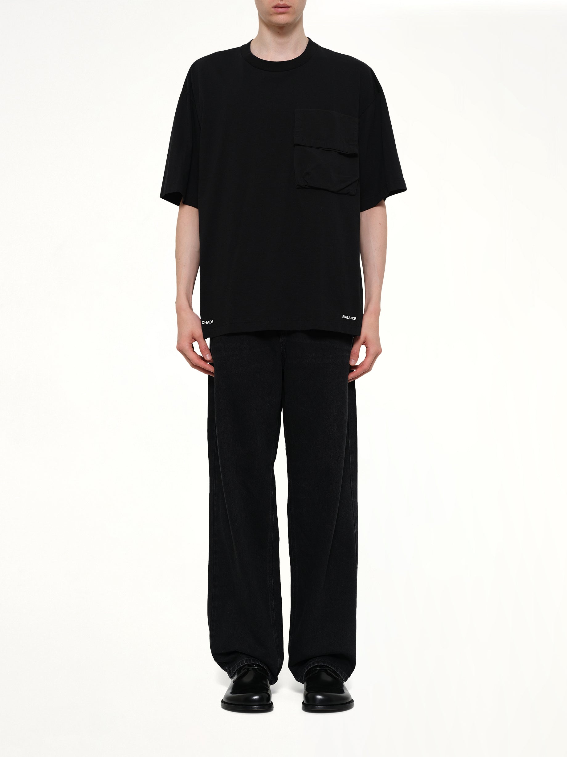 UNDERCOVER Chaos Balance Pocket T-Shirt in Black Model View from MARAIS