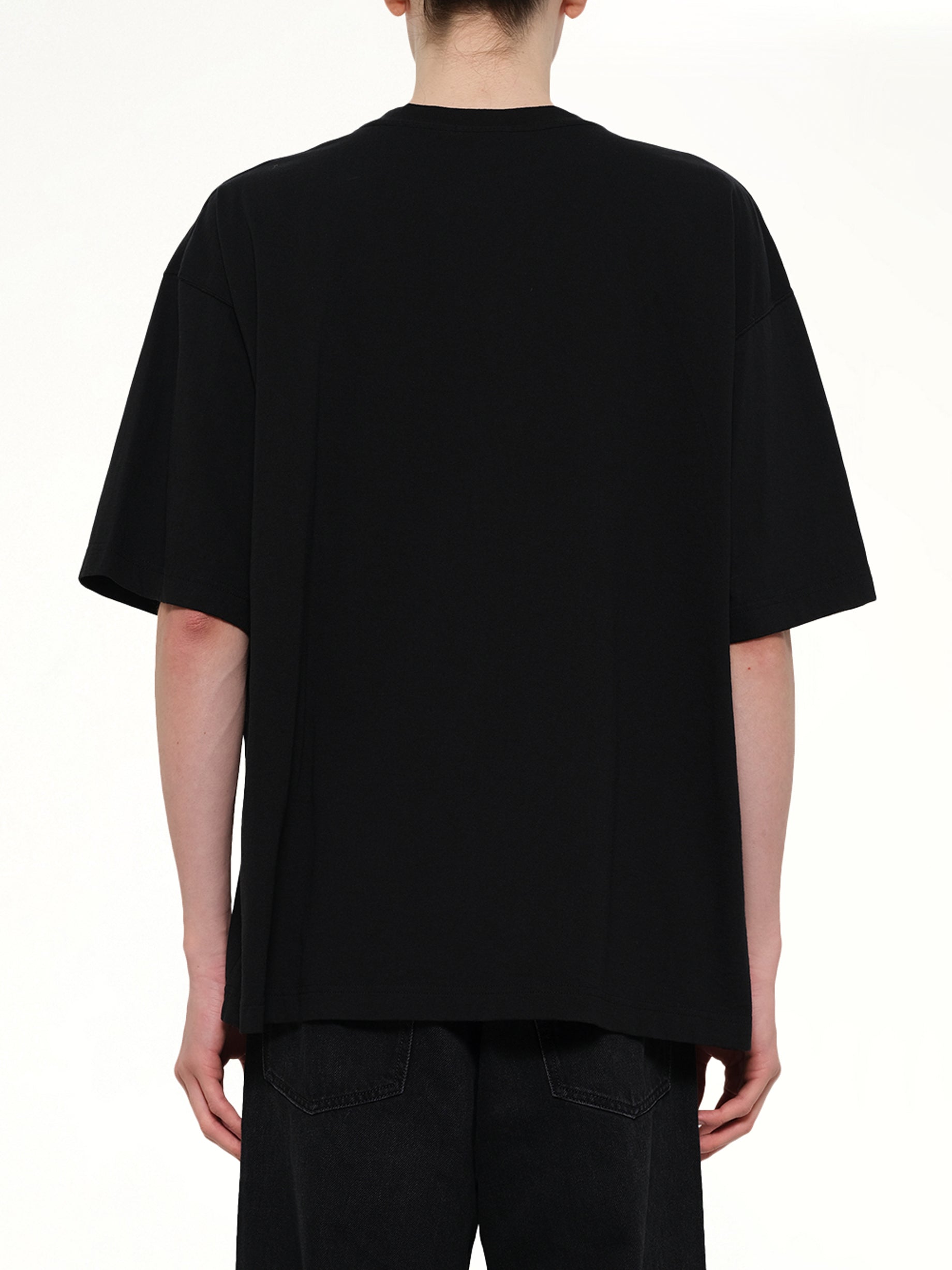 UNDERCOVER Chaos Balance Pocket T-Shirt in Black Back View from MARAIS