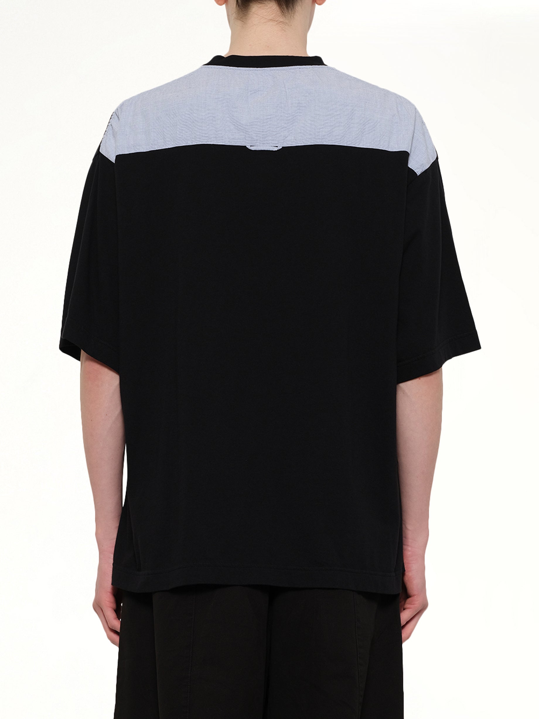 UNDERCOVER Combo Pocket T-Shirt in Black Back View from MARAIS