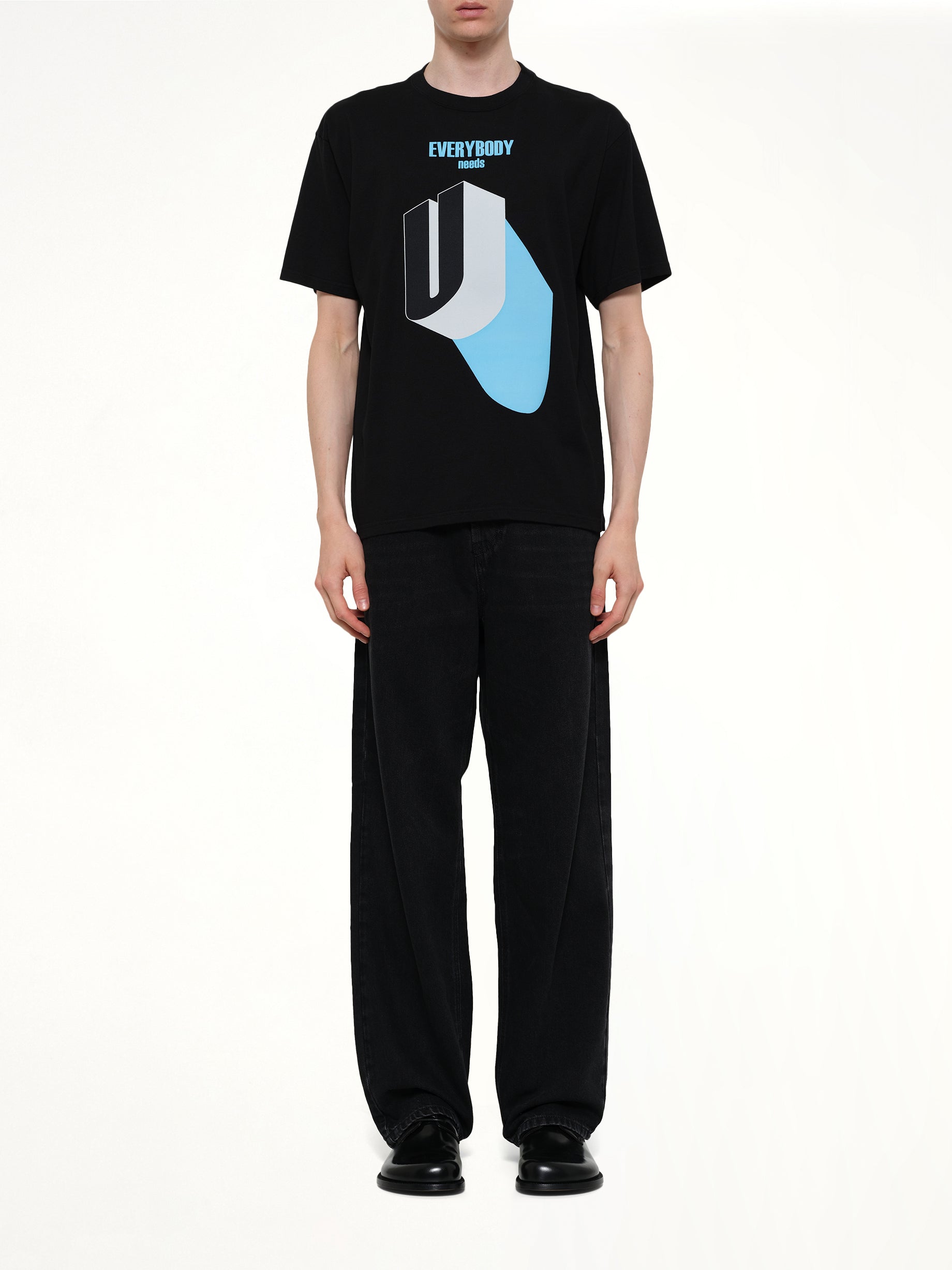 UNDERCOVER Everybody Needs U T-Shirt in Black Model View from MARAIS