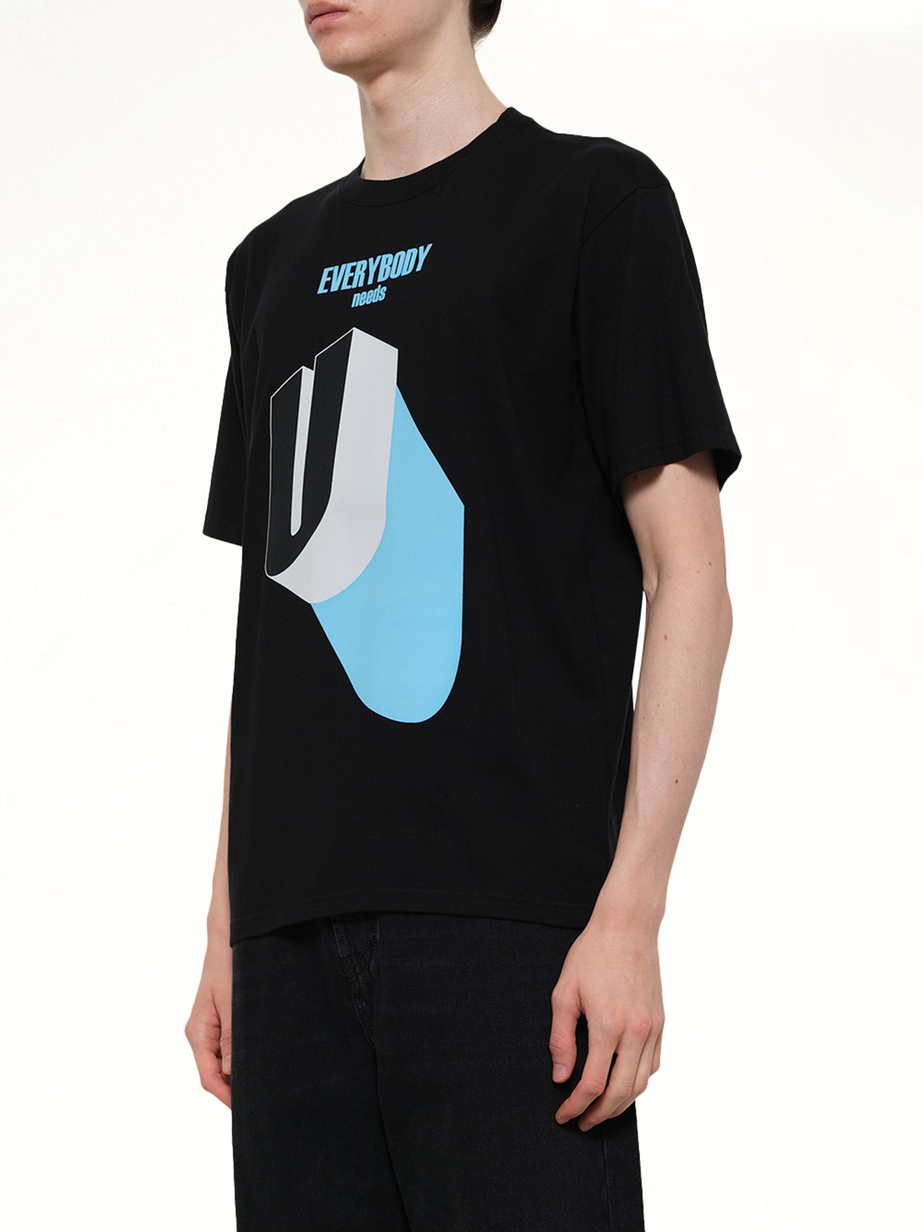 UNDERCOVER Everybody Needs U T-Shirt in Black Side View from MARAIS
