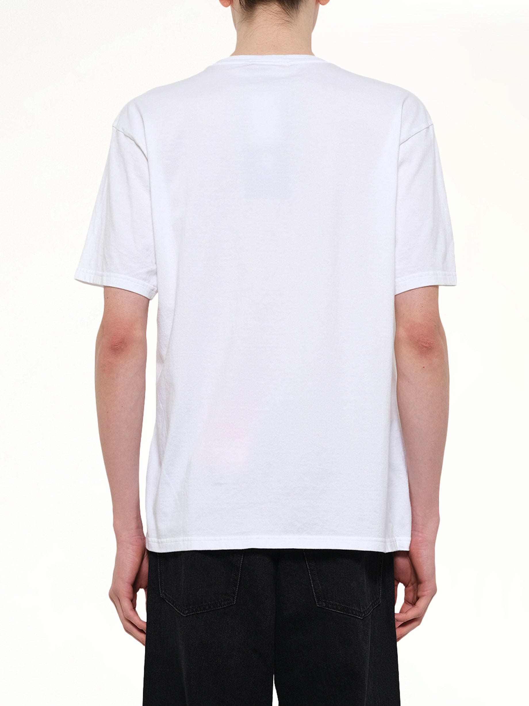 UNDERCOVER Everybody Needs U T-Shirt in White Back View from MARAIS