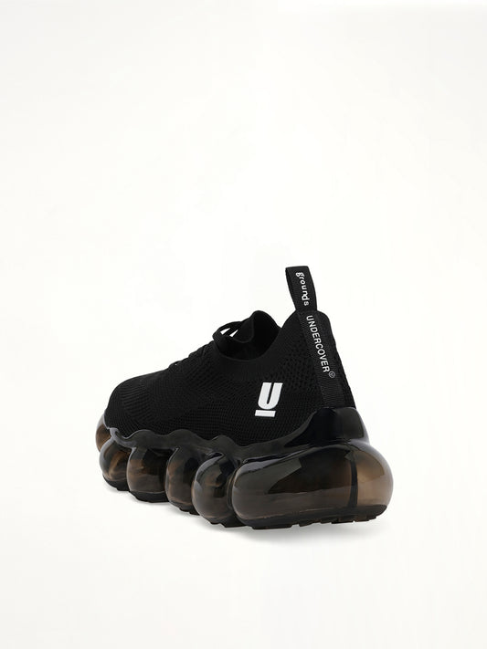 UC x Grounds Sneaker in Black