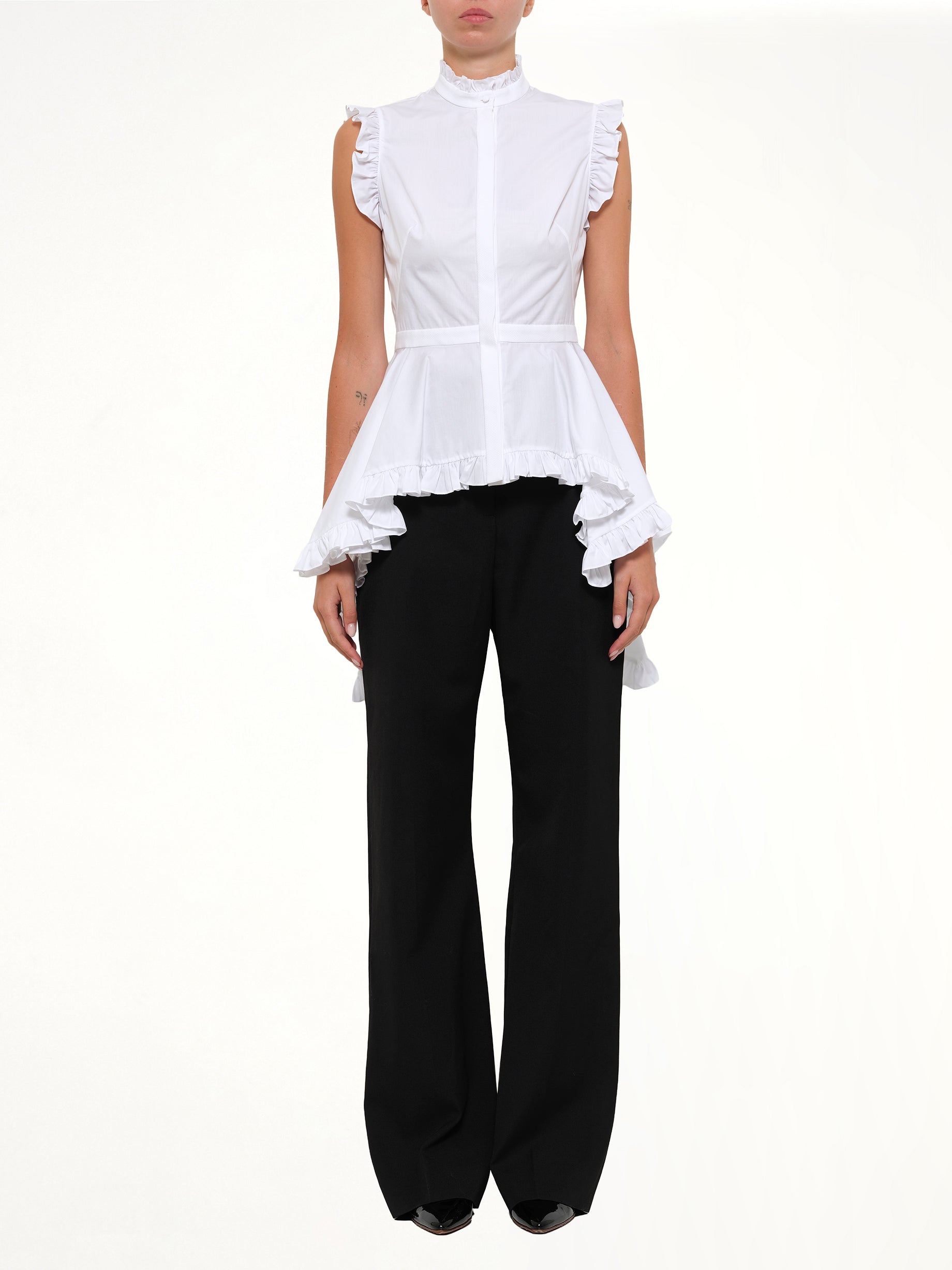ALEXANDER MCQUEEN Sleeveless Peplum Shirt in White Product Photo from MARAIS