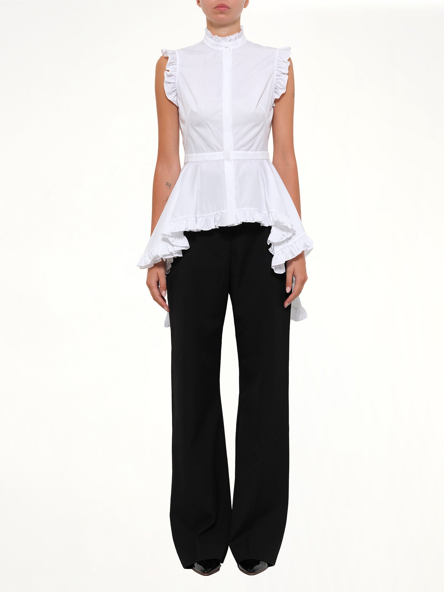 Sleeveless Peplum Shirt in White