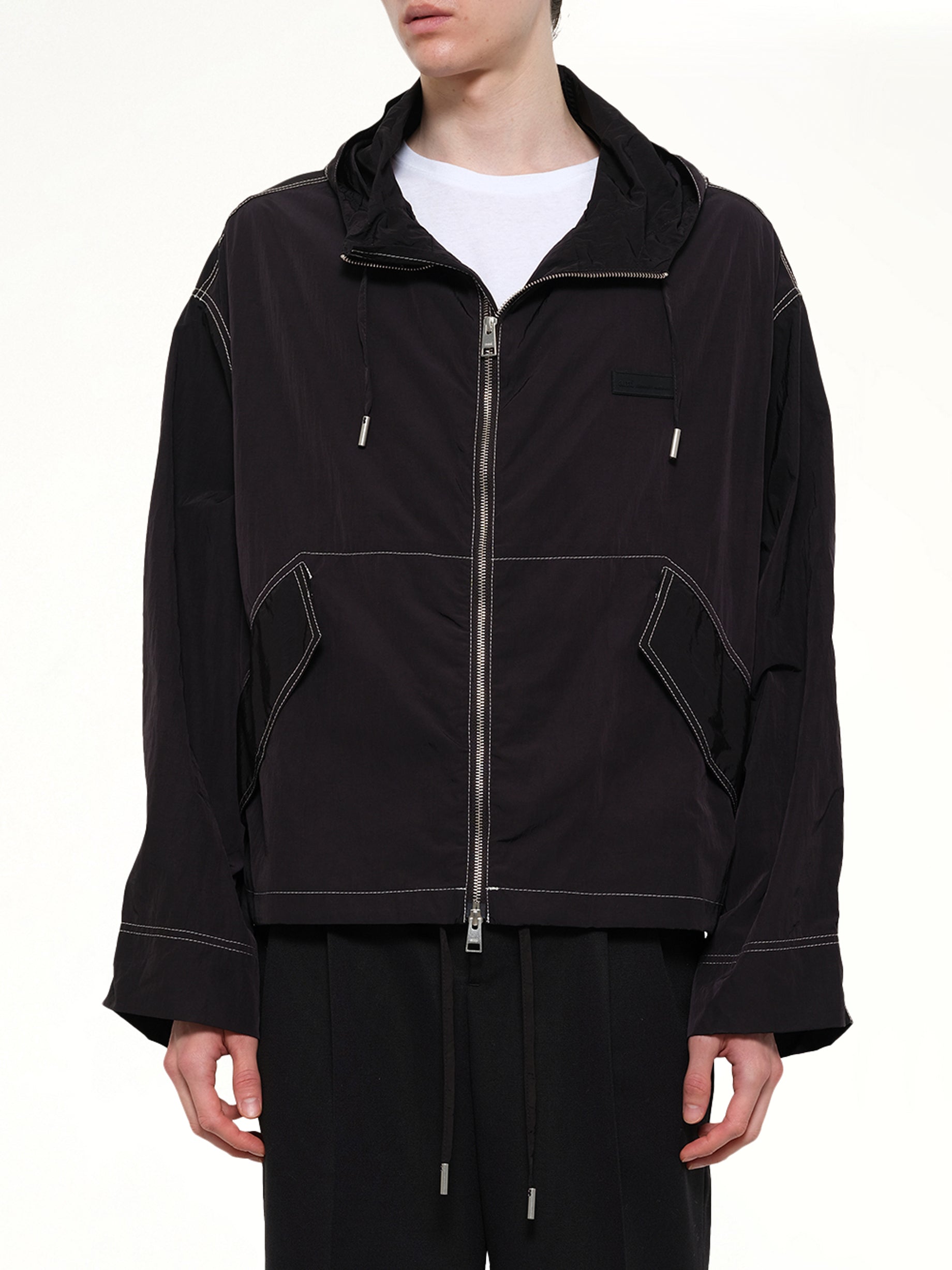 AMI PARIS Crinkle Nylon Zipped Jacket in Black Detail Shot from MARAIS