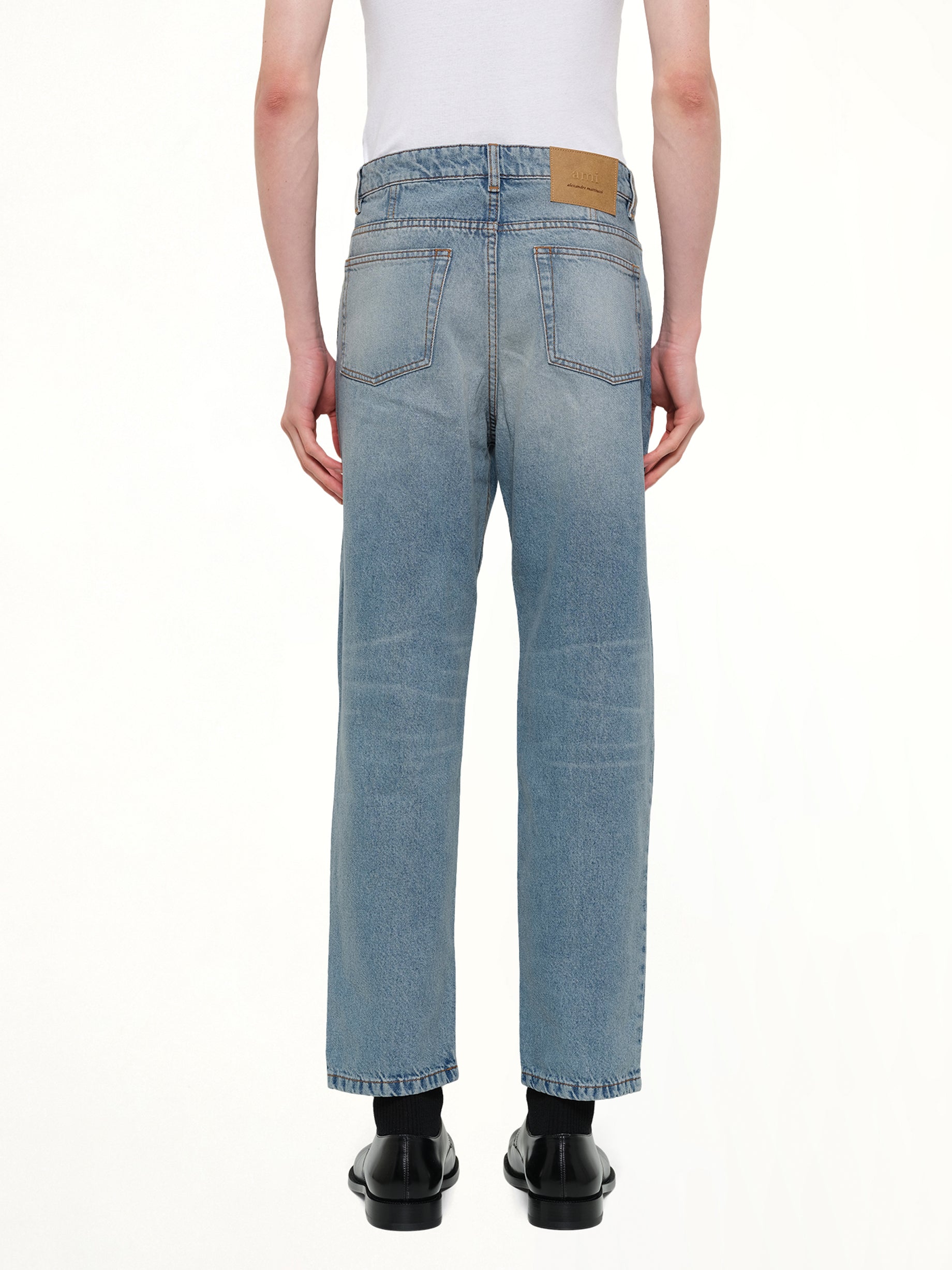 AMI PARIS Tapered Fit Jeans in Blue Back View from MARAIS
