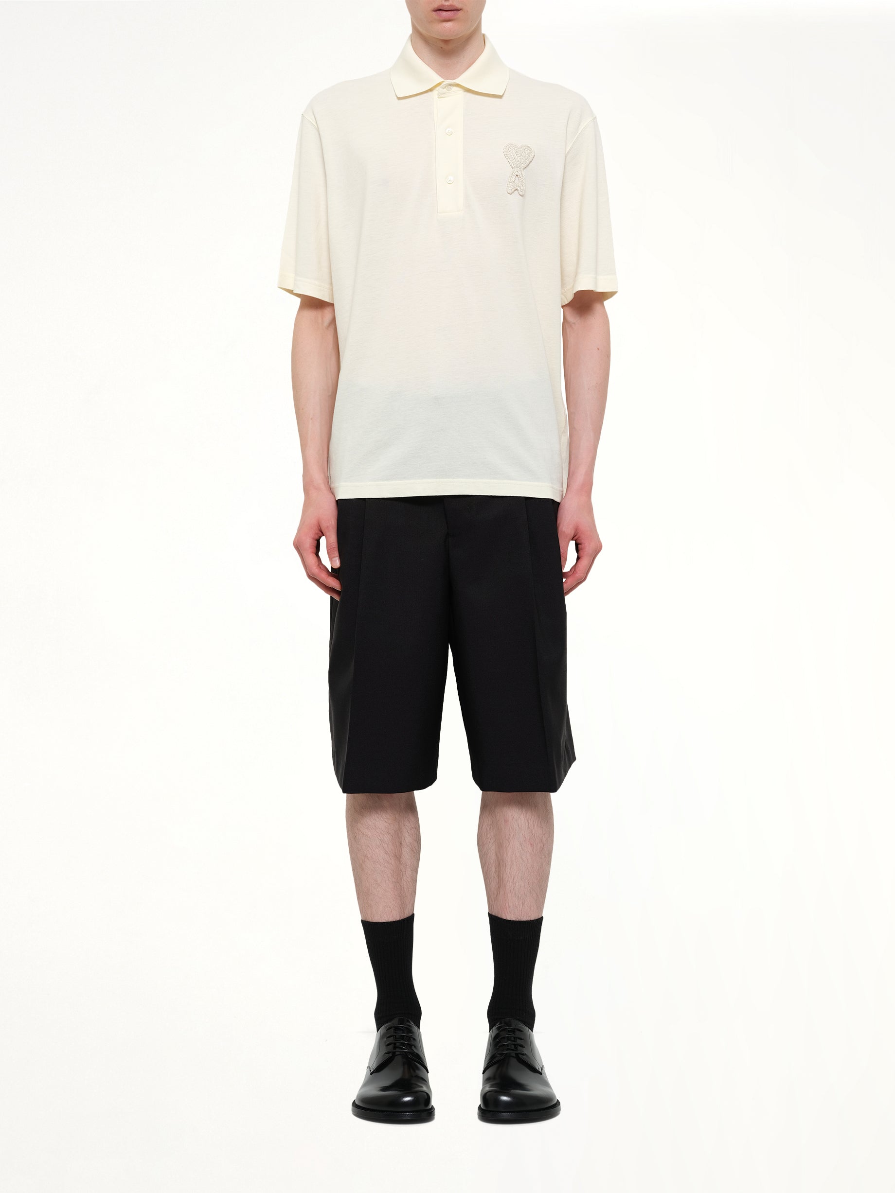 AMI PARIS Knitted ADC Boxy Polo in Off White Model View from MARAIS