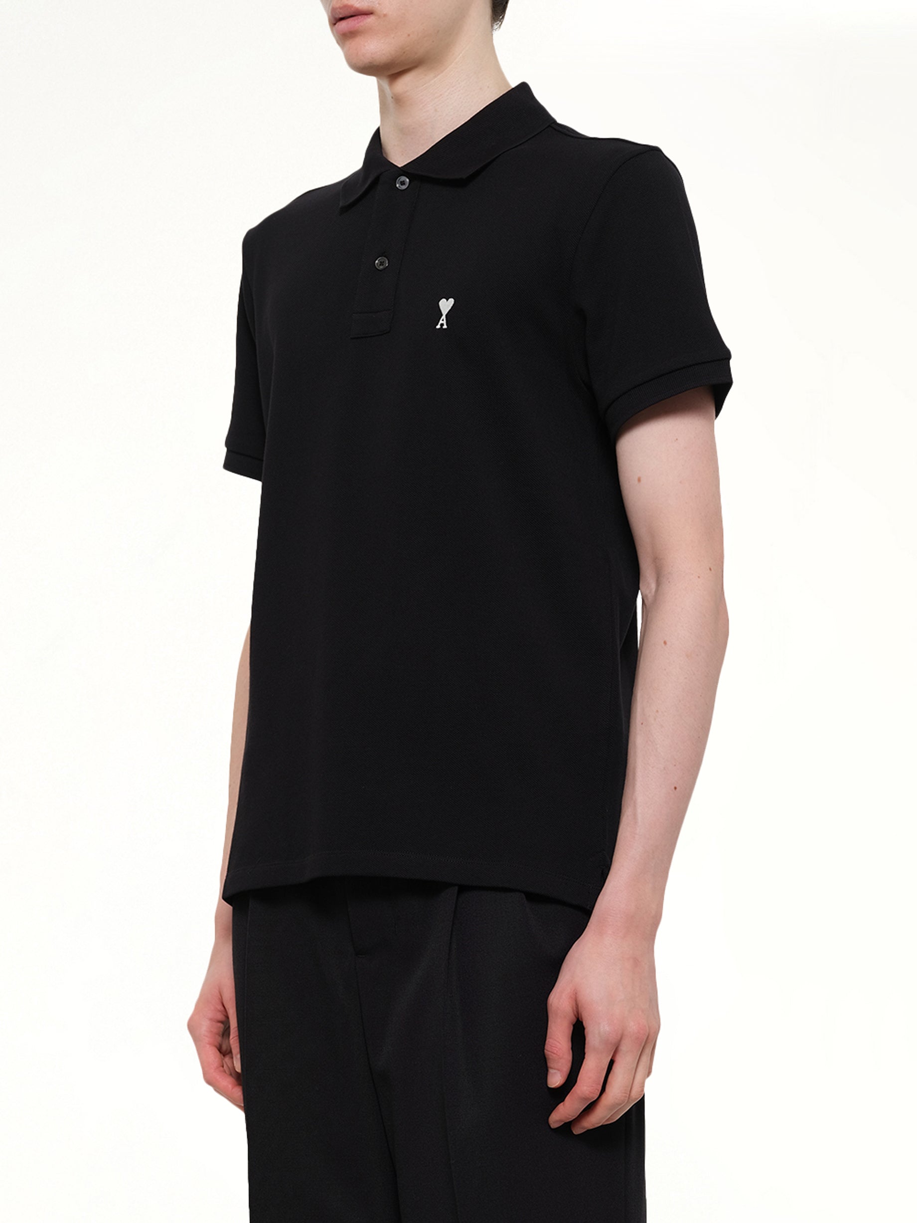AMI PARIS Contrasted ADC Polo in Black Side View from MARAIS