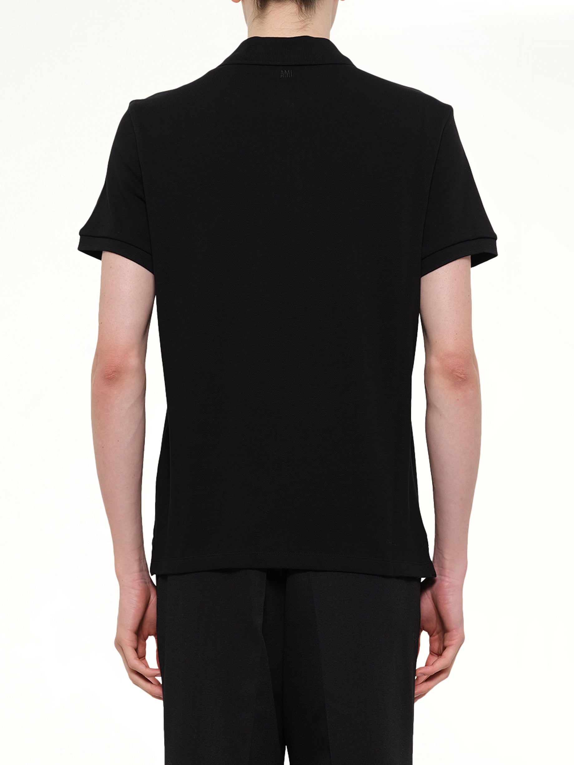 AMI PARIS Contrasted ADC Polo in Black Back View from MARAIS